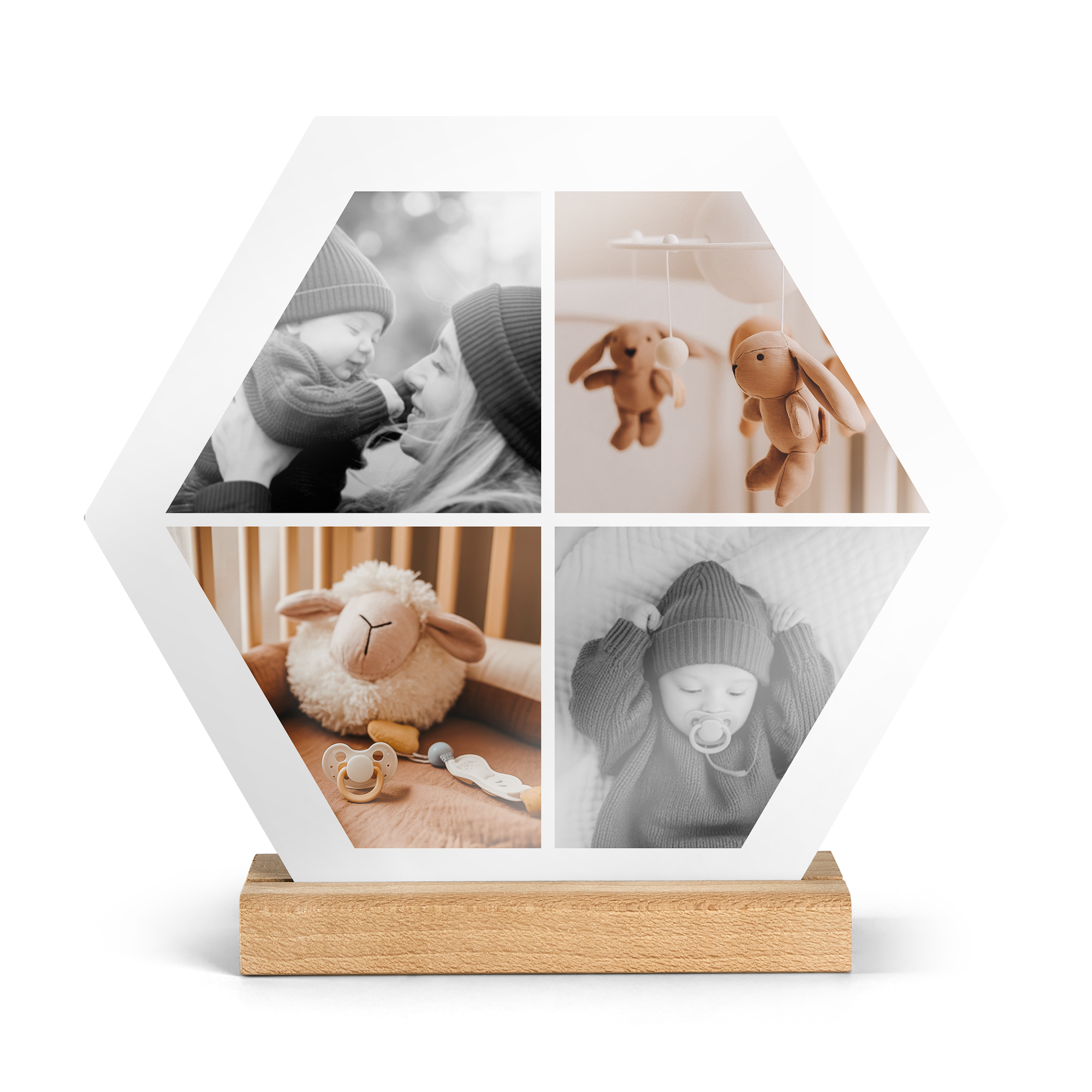 Mosaico de fotos hexagonal con 4 imágenes de bebé en blanco y negro, sobre base de madera.