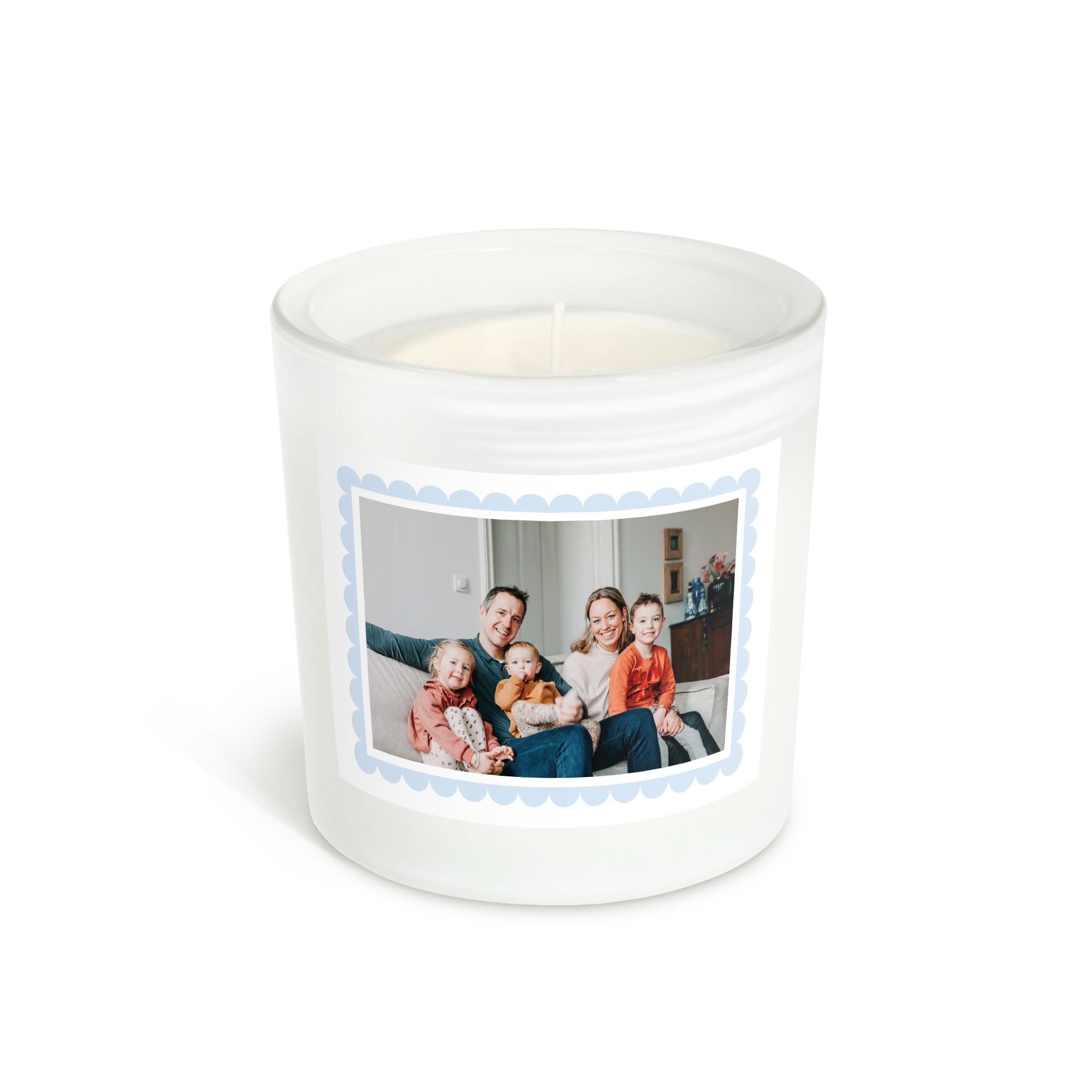 Personalised candle holder with a printed family photo on a white label with a blue scalloped border