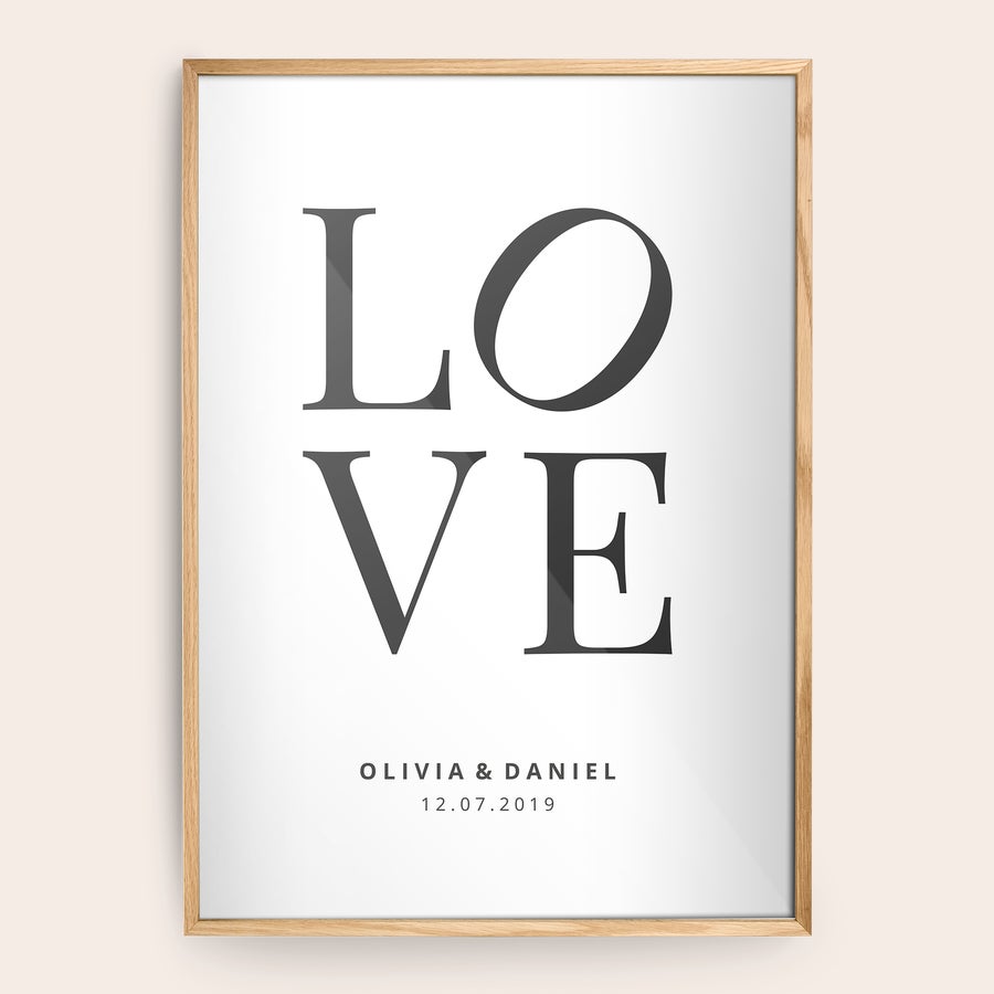 Personalised photo print with frame Personalized photo print in a light wooden frame with the word LOVE printed and custom names and date below it