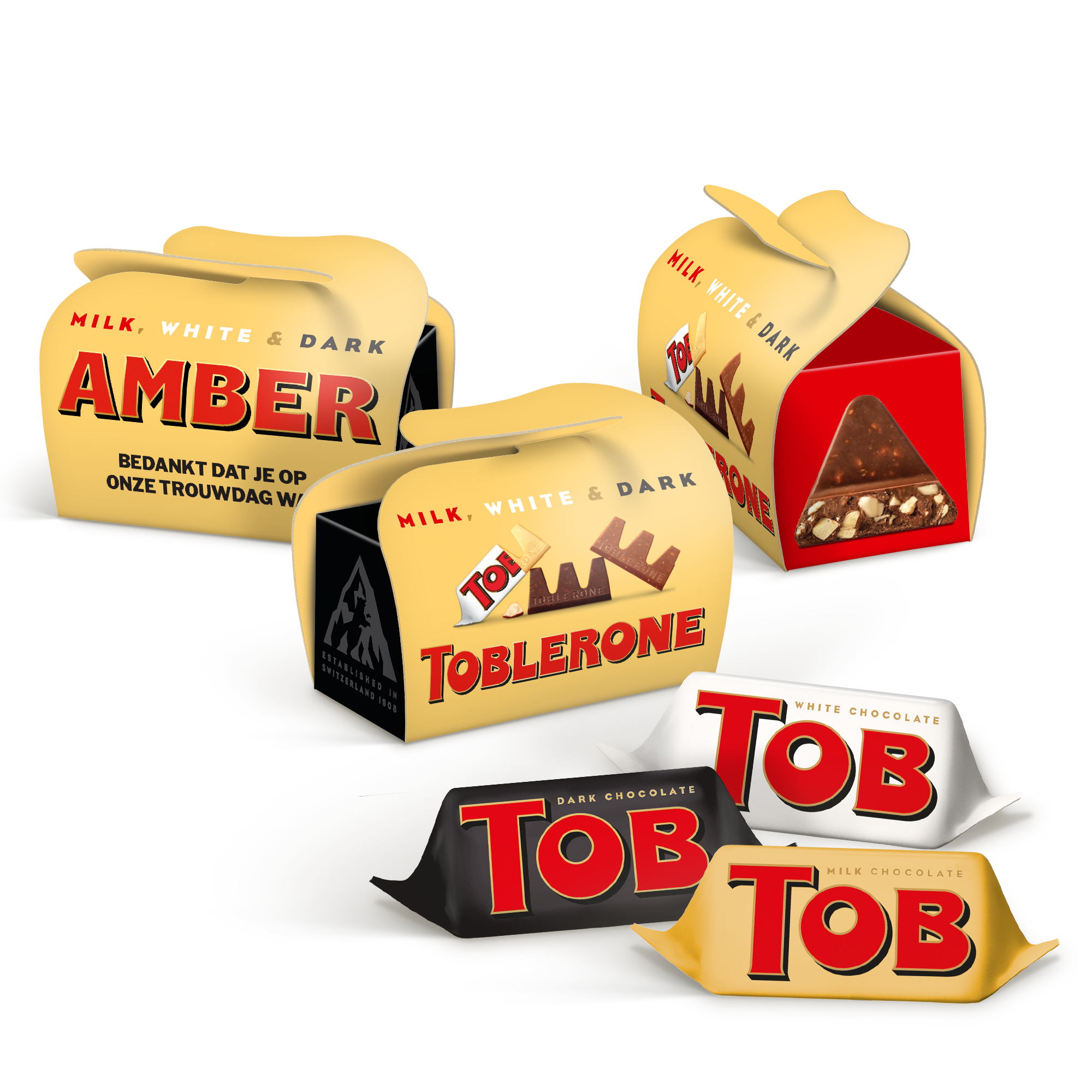Drie gepersonaliseerde mini-Toblerone doosjes met "Amber" en "Bedankt dat je op onze trouwdag was" erop, gevuld met chocolade traktaties op maat.
