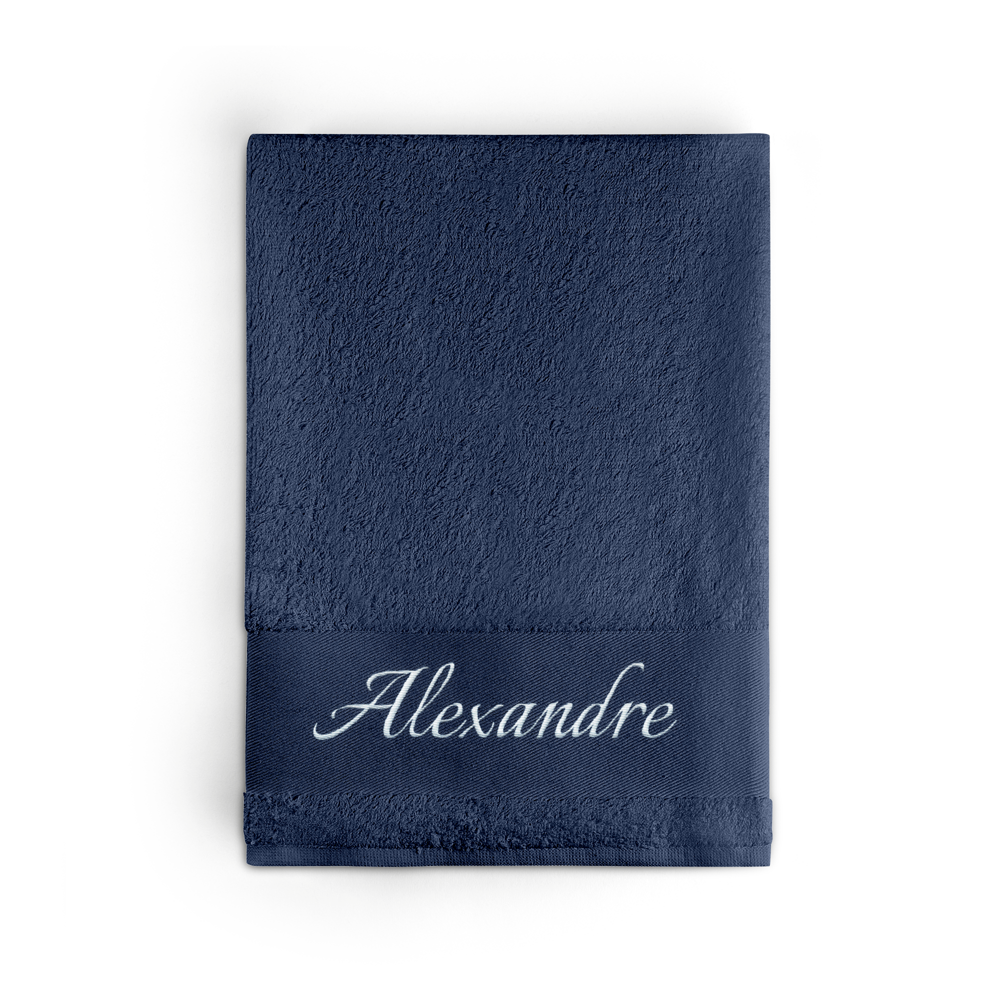 Toalha azul marinho personalizada com o nome Alexandre bordado em branco.