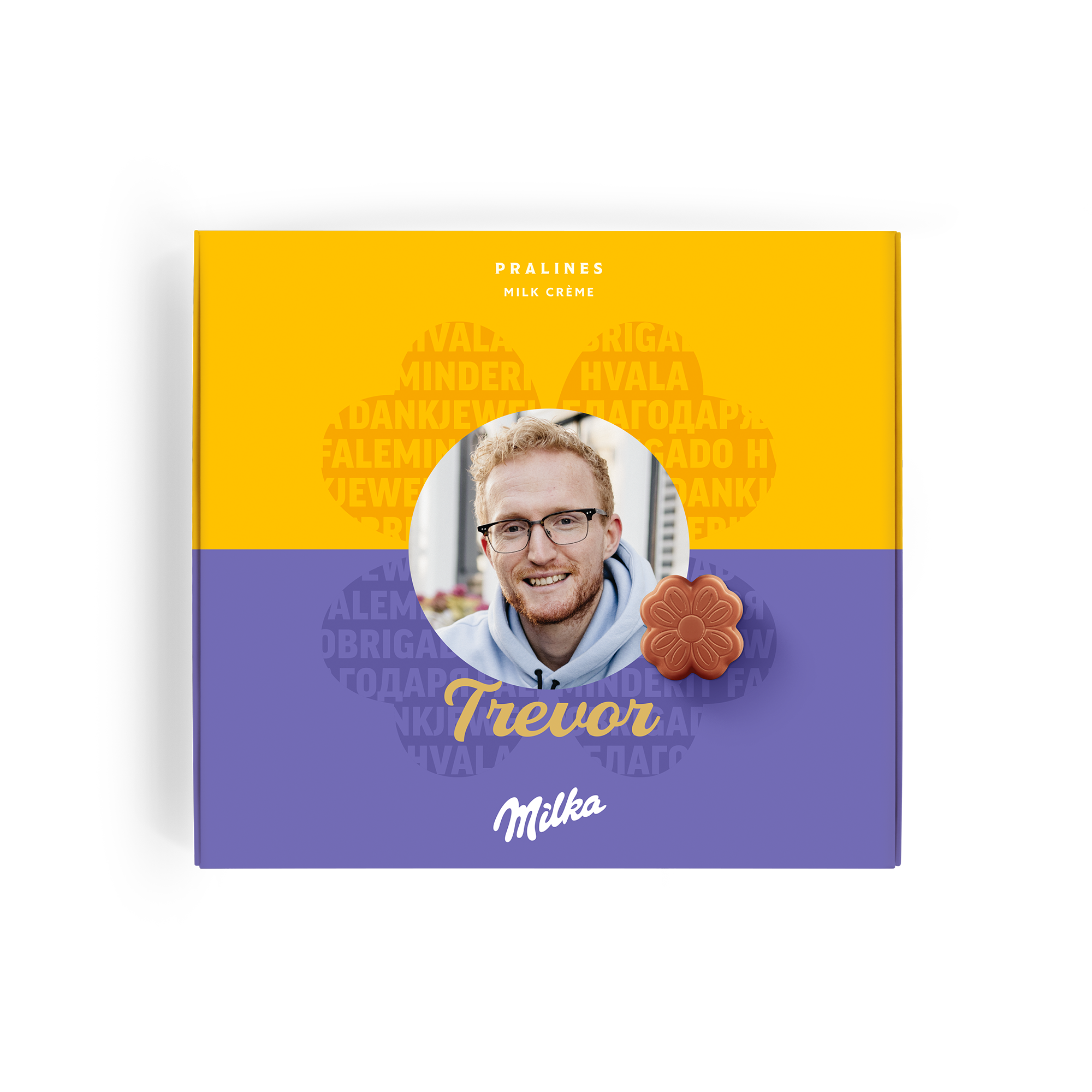 Přizpůsobená Milka dárková krabička s fotografií muže a jménem Trevor, vytištěná s nápisem "Hvala" v různých jazycích.