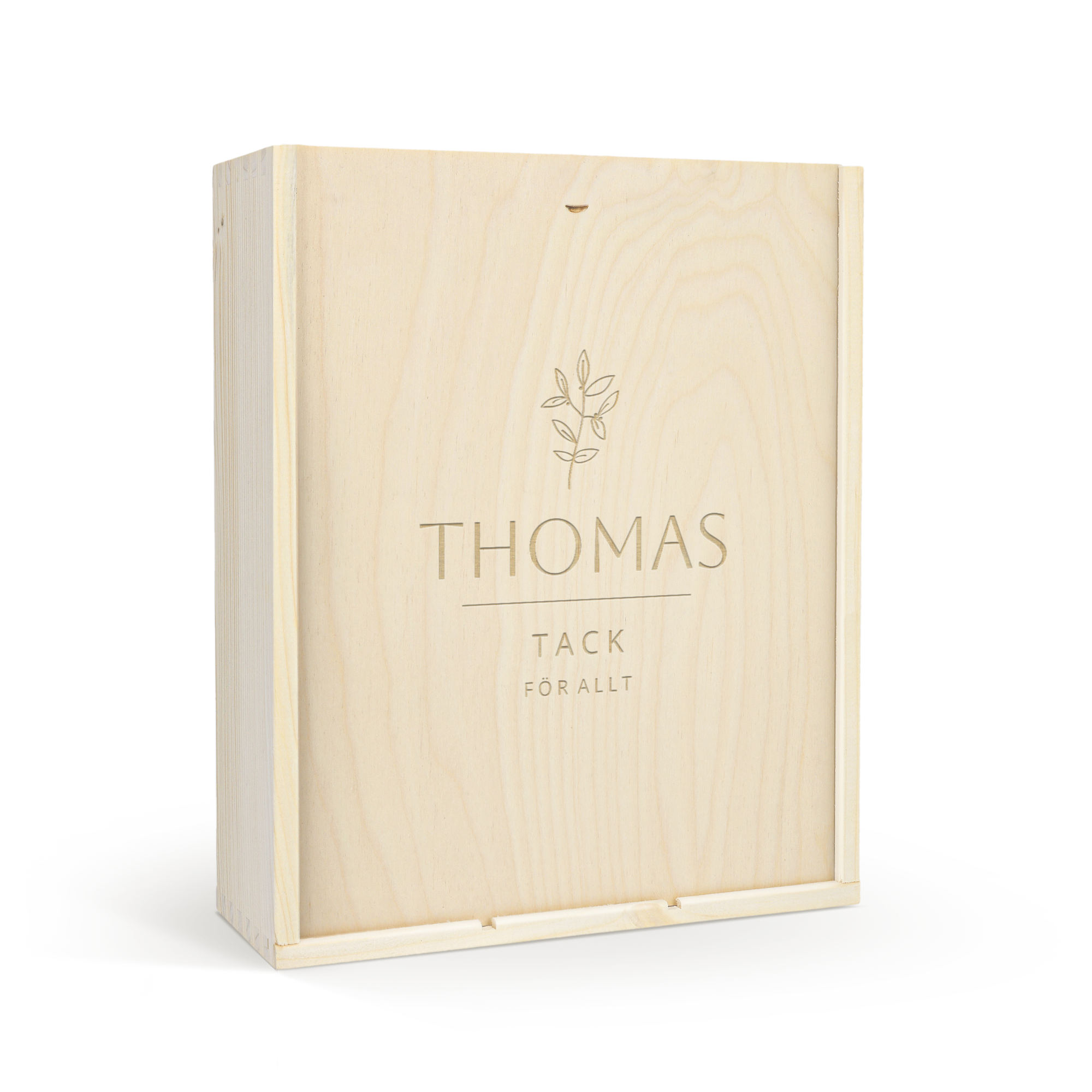 Graverad vinlåda i trä för Belvy vinpaket, med texten "THOMAS TACK FÖR ALLT" och bladmönster, en perfekt present.