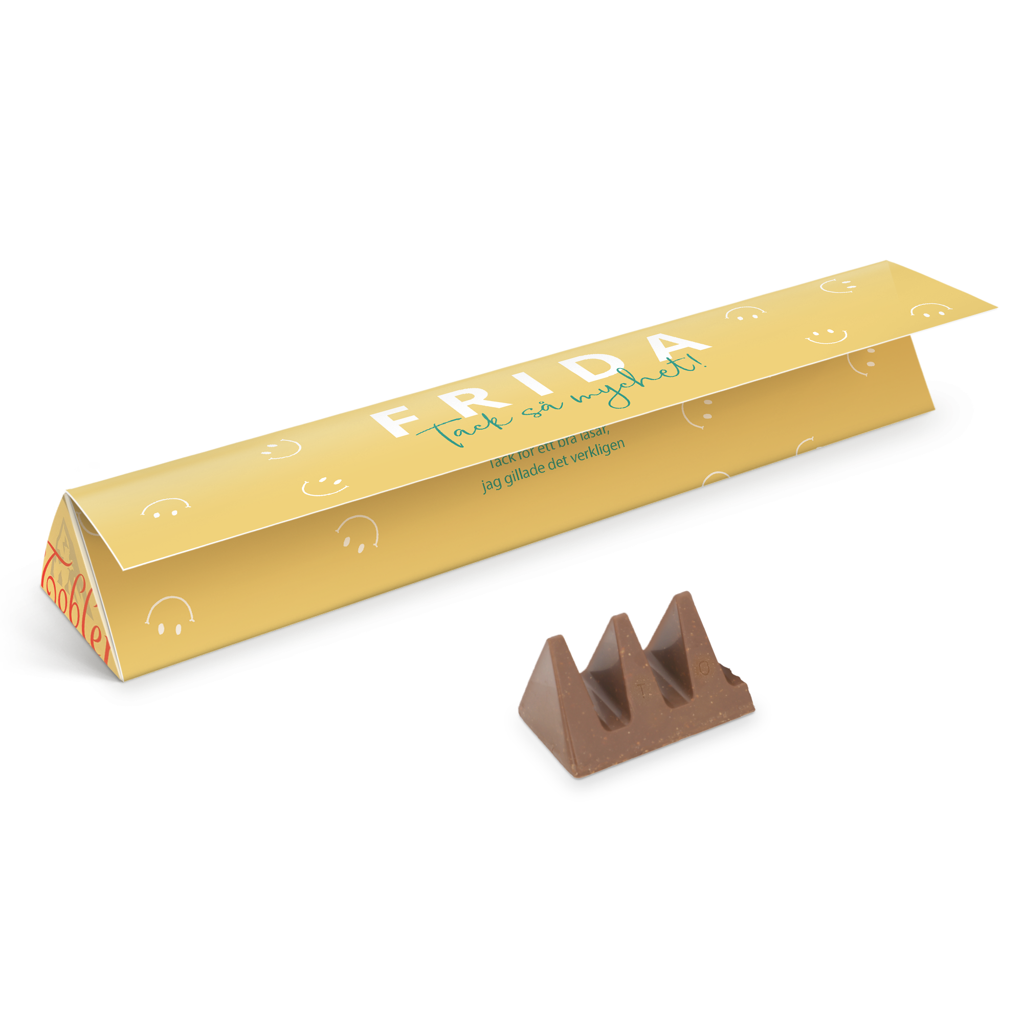 En personaliserad Toblerone är betydligt godare. Gul förpackning med texten FRIDA tack så mycket och ett chokladstycke.