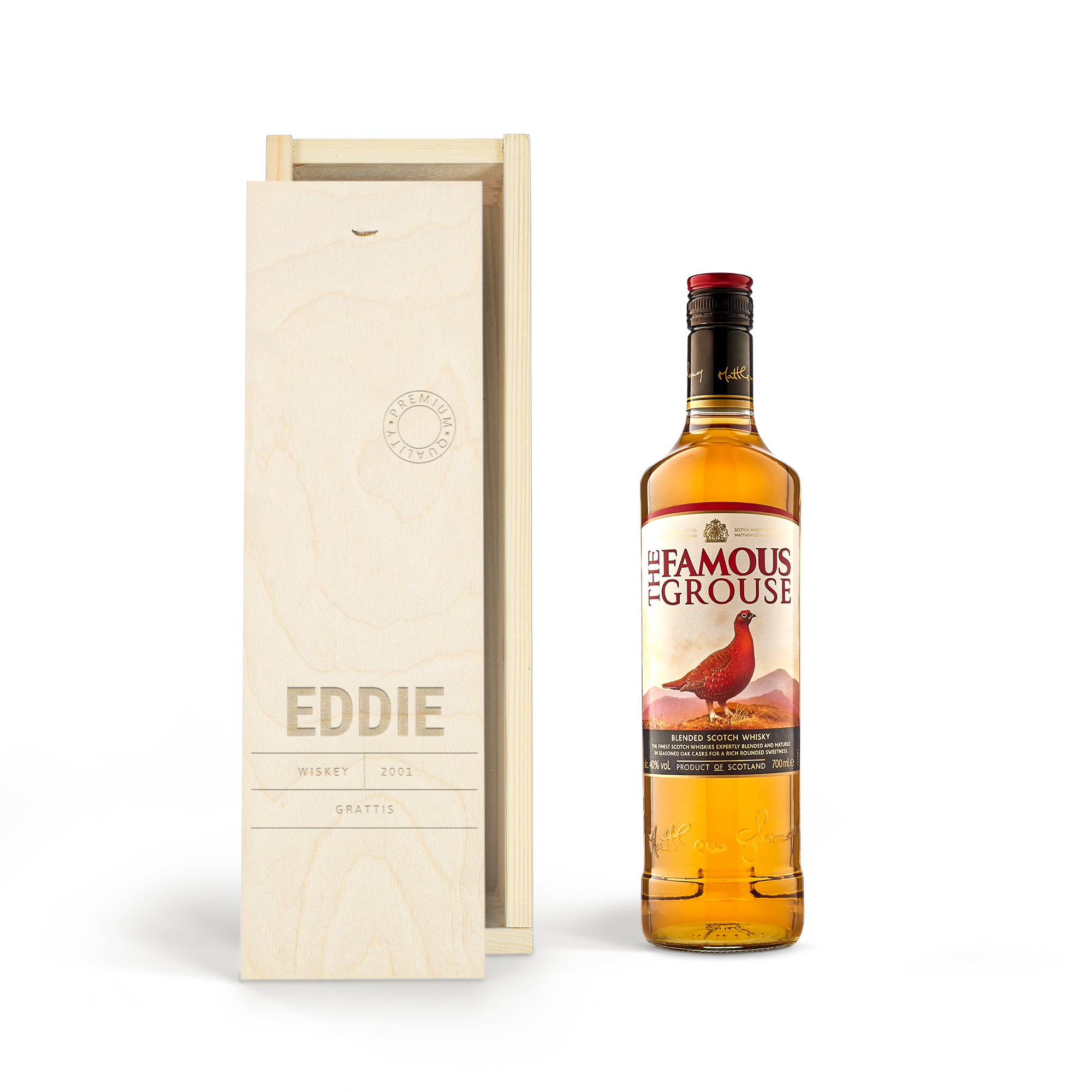 Flaska The Famous Grouse-whisky i en graverad träask med namnet Eddie och texten Wiskey 2001 Grattis