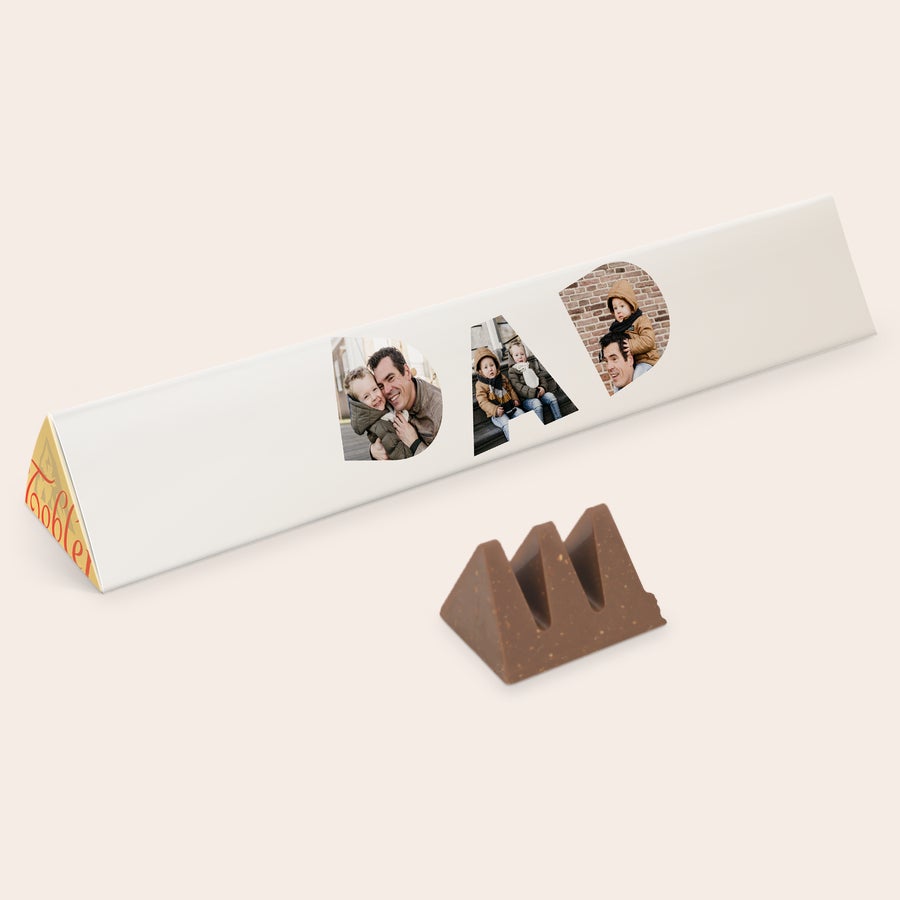 Toblerone XXL bar Personalizirana ploščica z mlečno čokolado Toblerone XXL z besedo DAD iz fotografij, natisnjena na ovitku