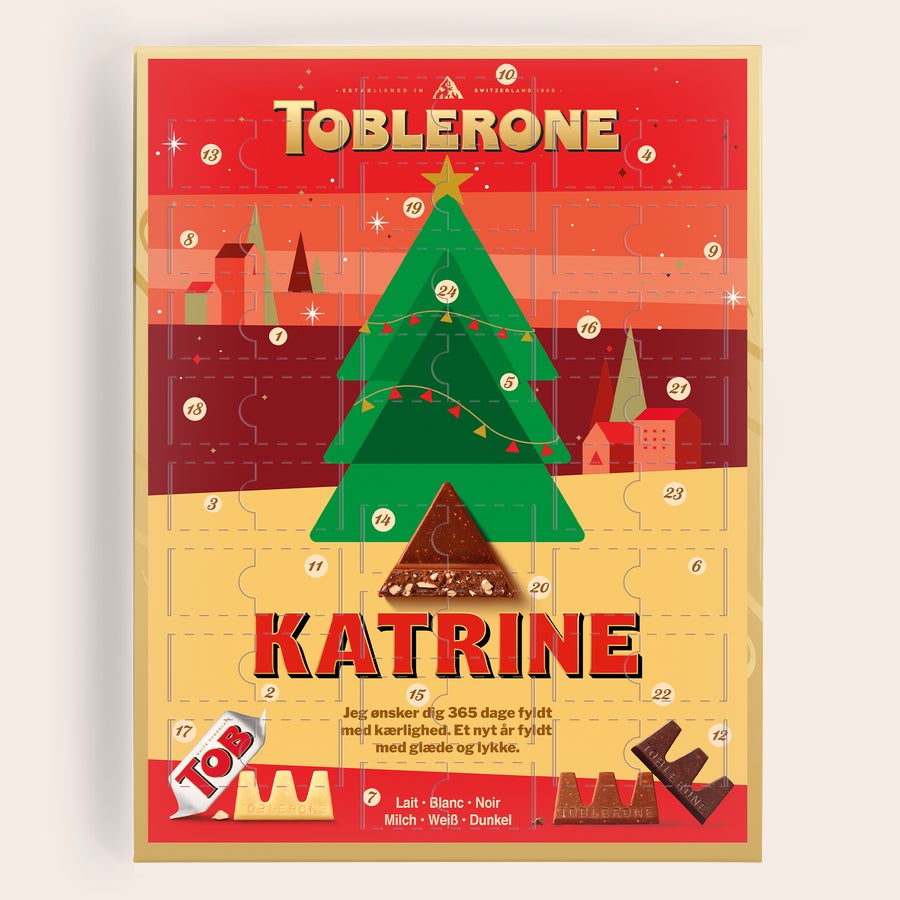 Chokolade julekalender med eget design - Toblerone Personlig Toblerone julekalender med navn Katrine og et citat, trykt på kalenderen.