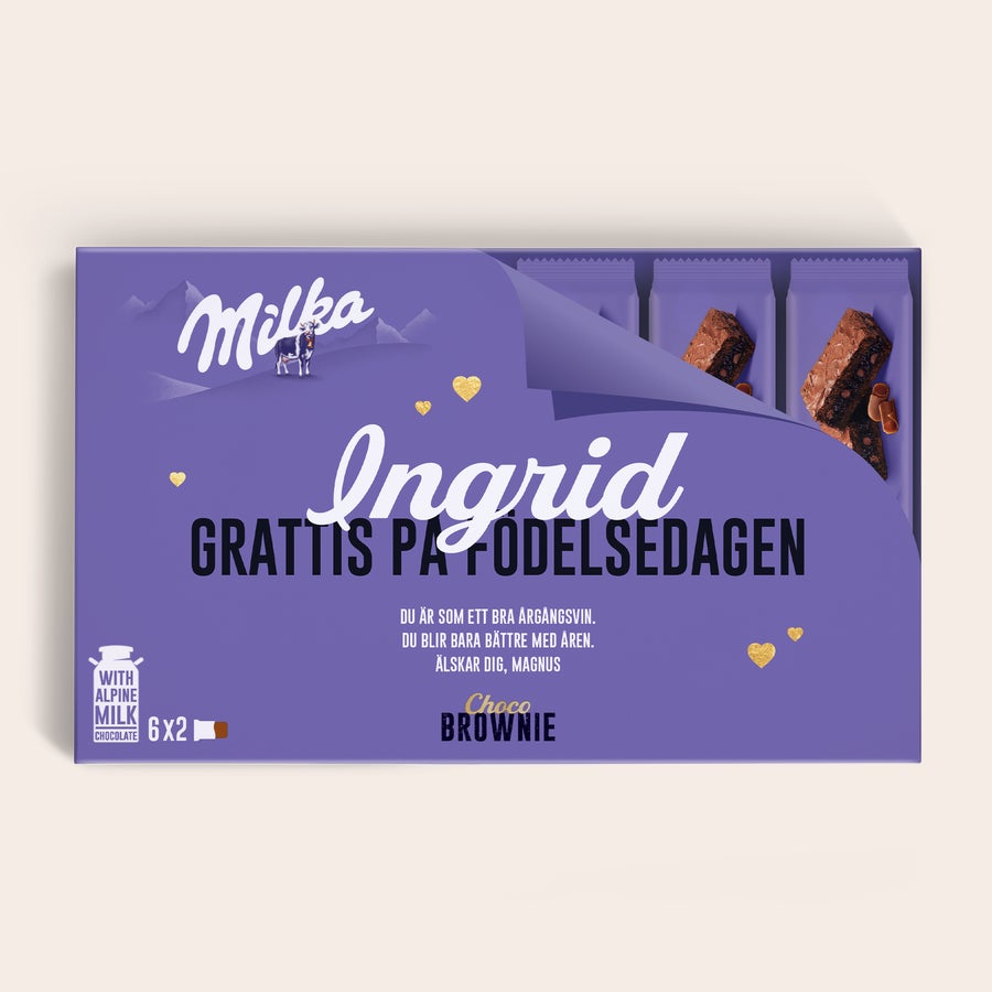 Milka Brownies Personlig Milka Choco Brownie presentask med namnet Ingrid och texten "GRATTIS PÅ FÖDELSEDAGEN" tryckt i lila färg.