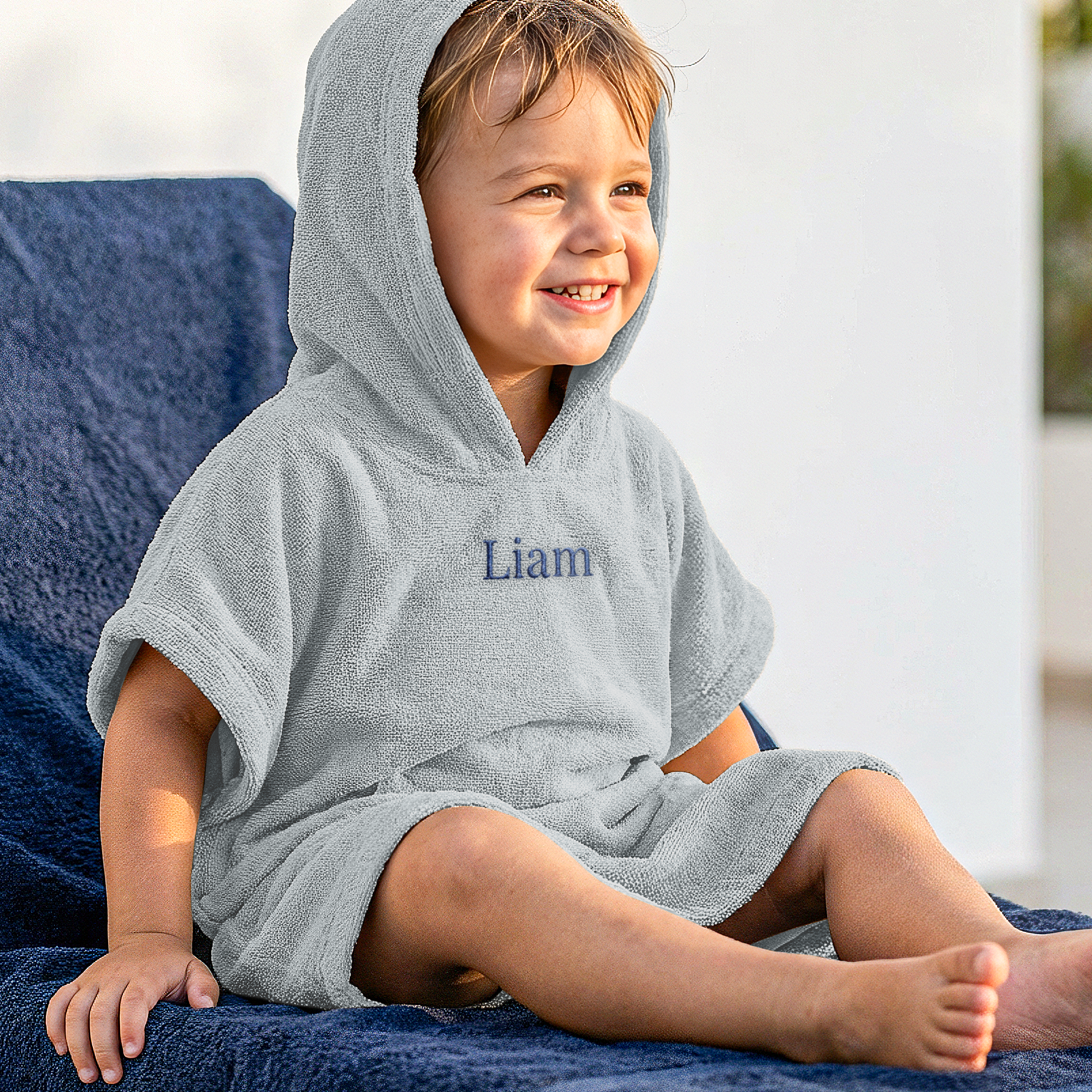 Kinderponcho met naam geborduurd