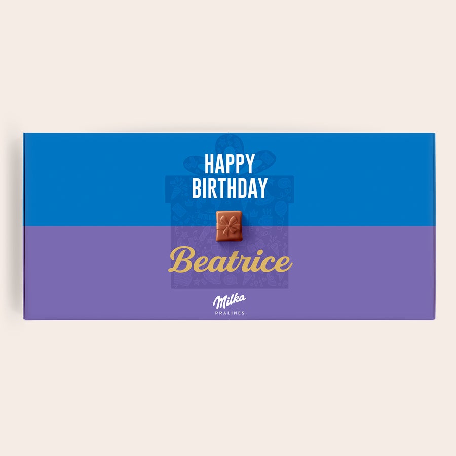 Personlig presentförpackning med Happy Birthday-choklad från Milka Lila och blå personlig Milka-presentförpackning med texten Happy Birthday och namnet Beatrice, för att gratulera någon på födelsedagen.