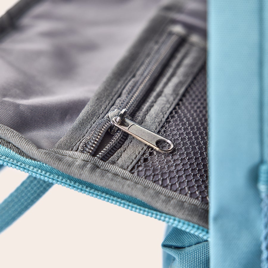 Personalised backpack - Printed Close-up of a personalised backpack with a zippered pocket and mesh side pocket