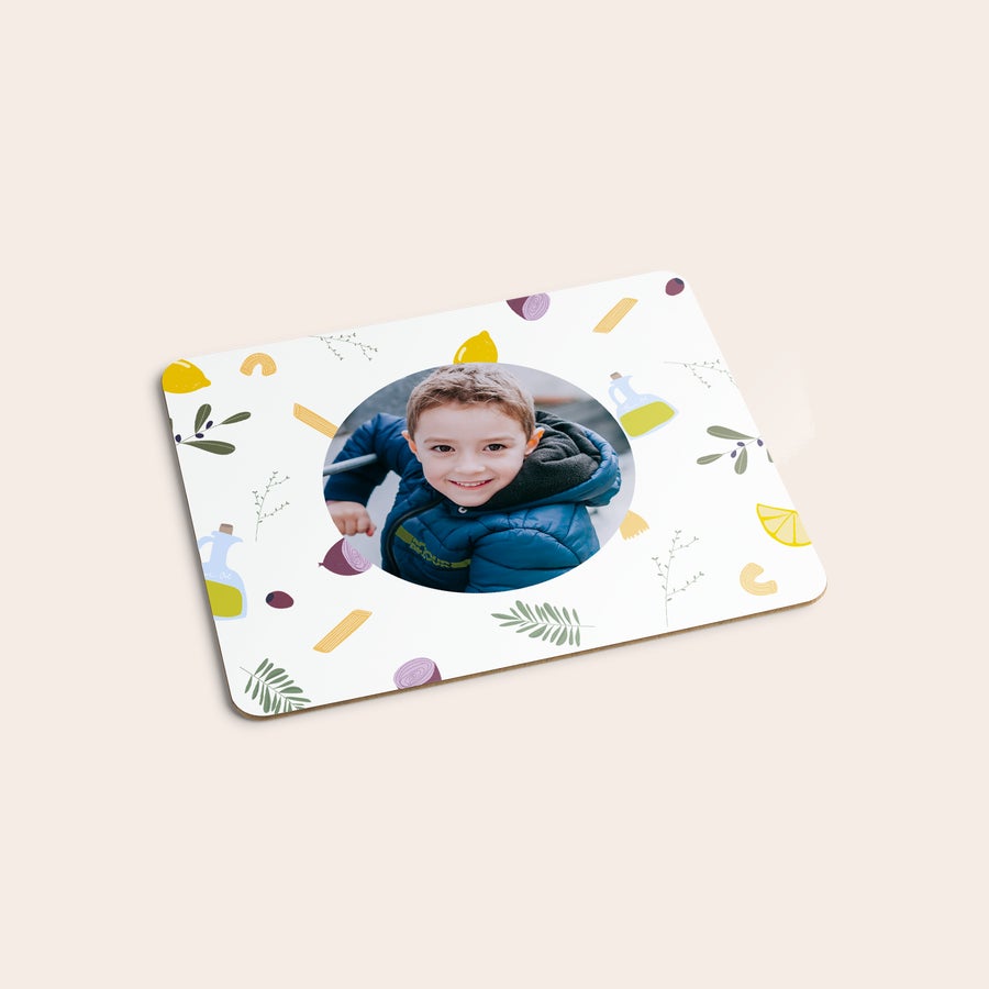 Personalised placemat Personalized placemat printed with a photo of a smiling child and kitchen-themed graphics