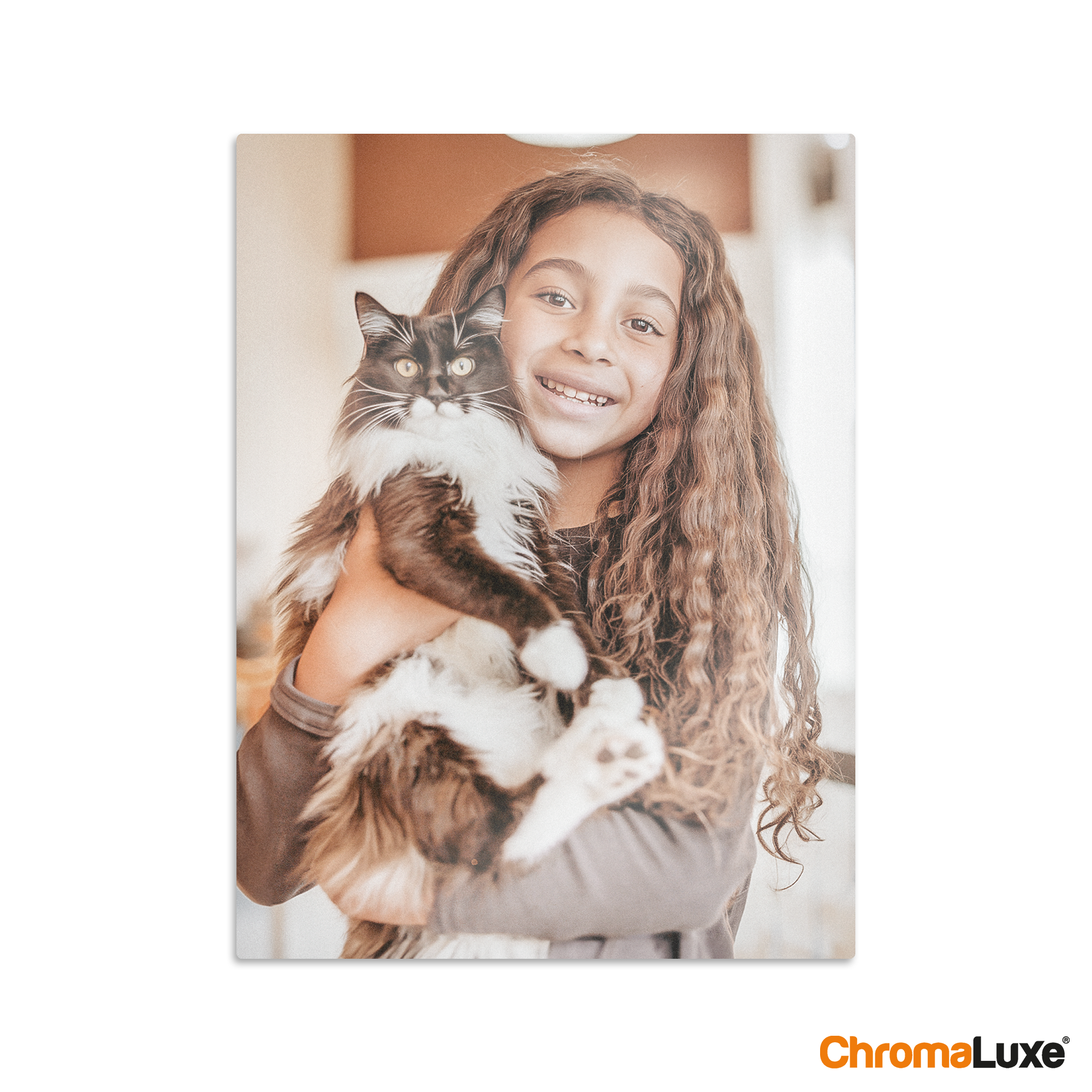 Chromaluxe aluminium photo print of a smiling girl holding a black and white cat, custom printed with your favorite memories.