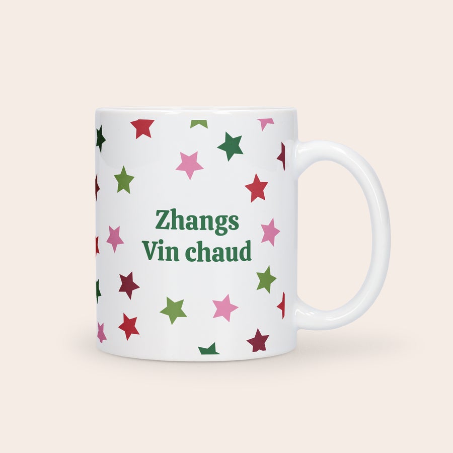 Mug Noël avec photo Mug de Noël personnalisé blanc avec un motif d'étoiles colorées et le texte Vin chaud imprimé.