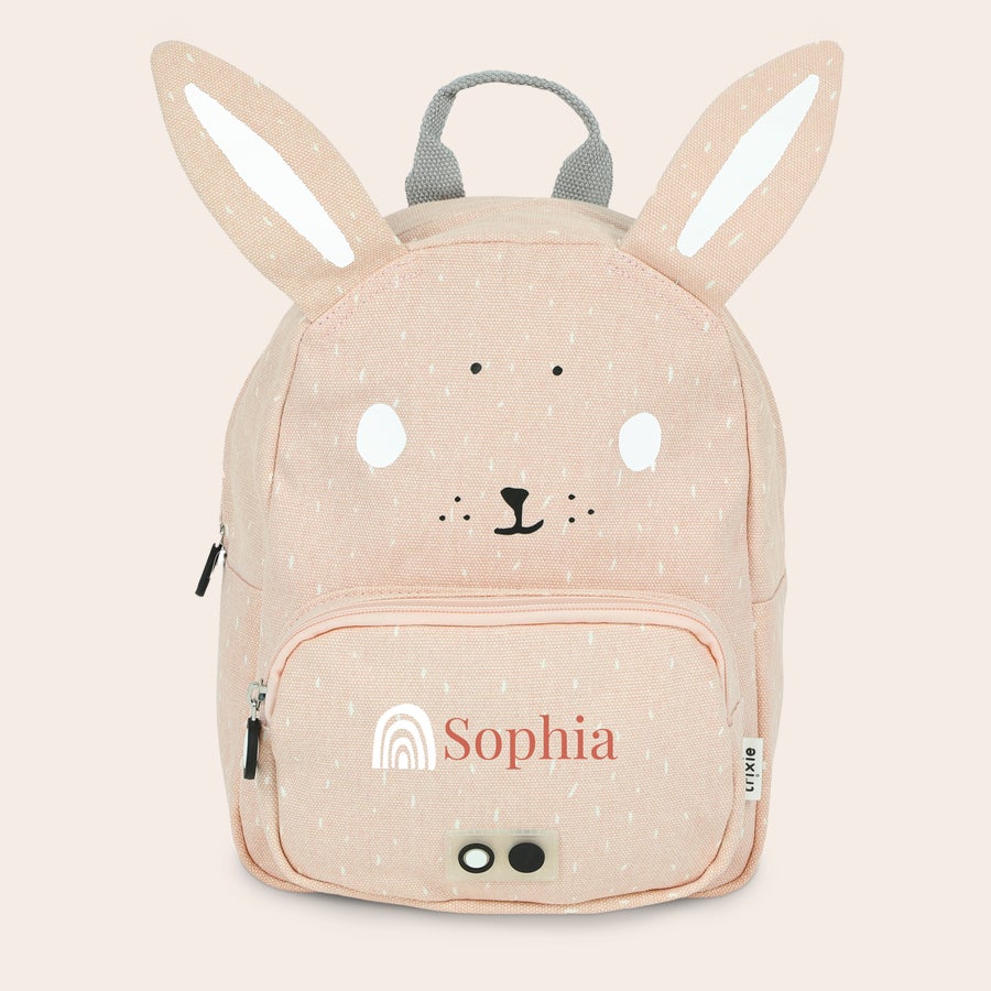 Mochila infantil personalizada - Trixie Mochila infantil rosa de conejo con orejas largas, personalizada con el nombre Sophia en la parte delantera.