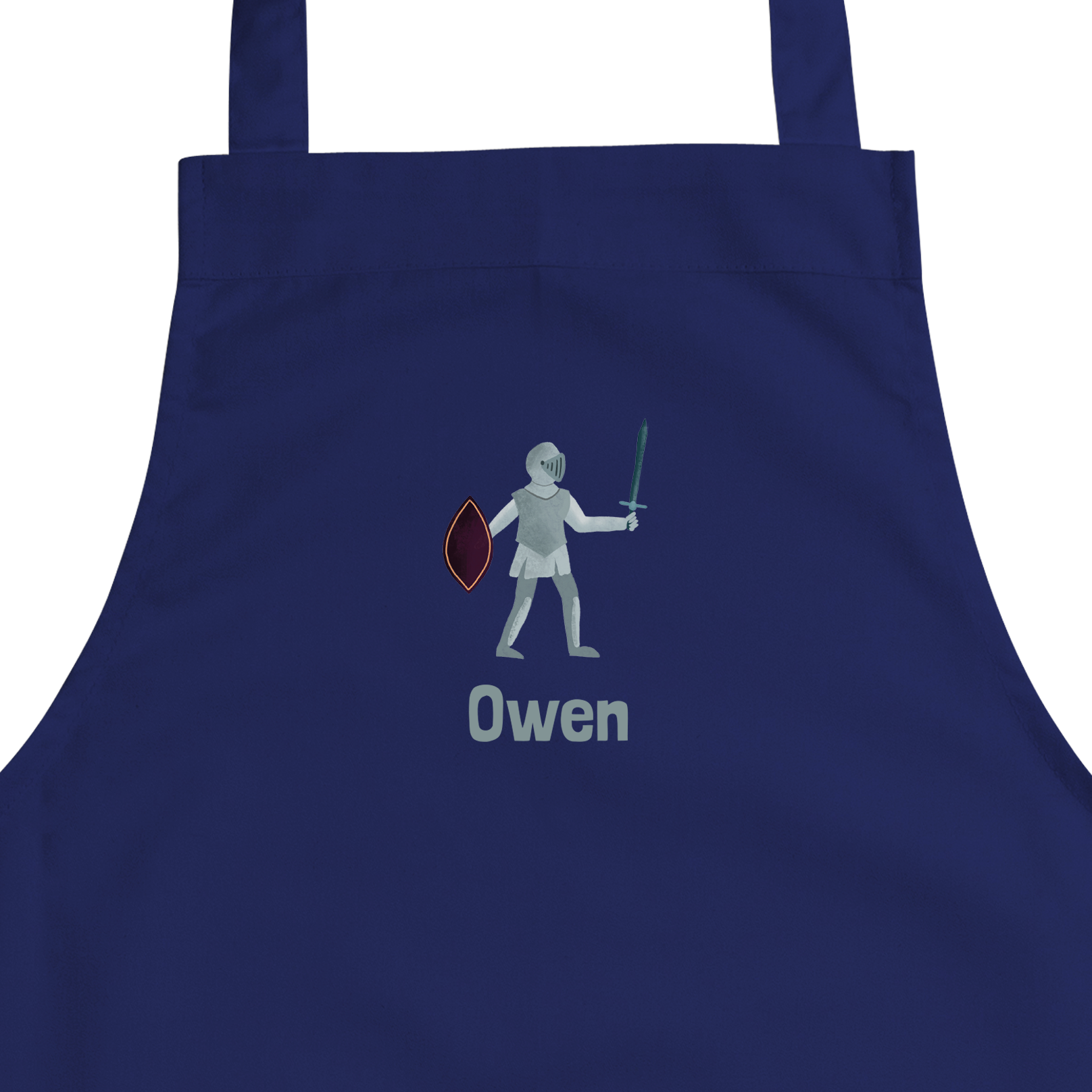 Grembiule per bambini blu con stampa di un cavaliere e del nome Owen. Sorprendi con un grembiule personalizzato.