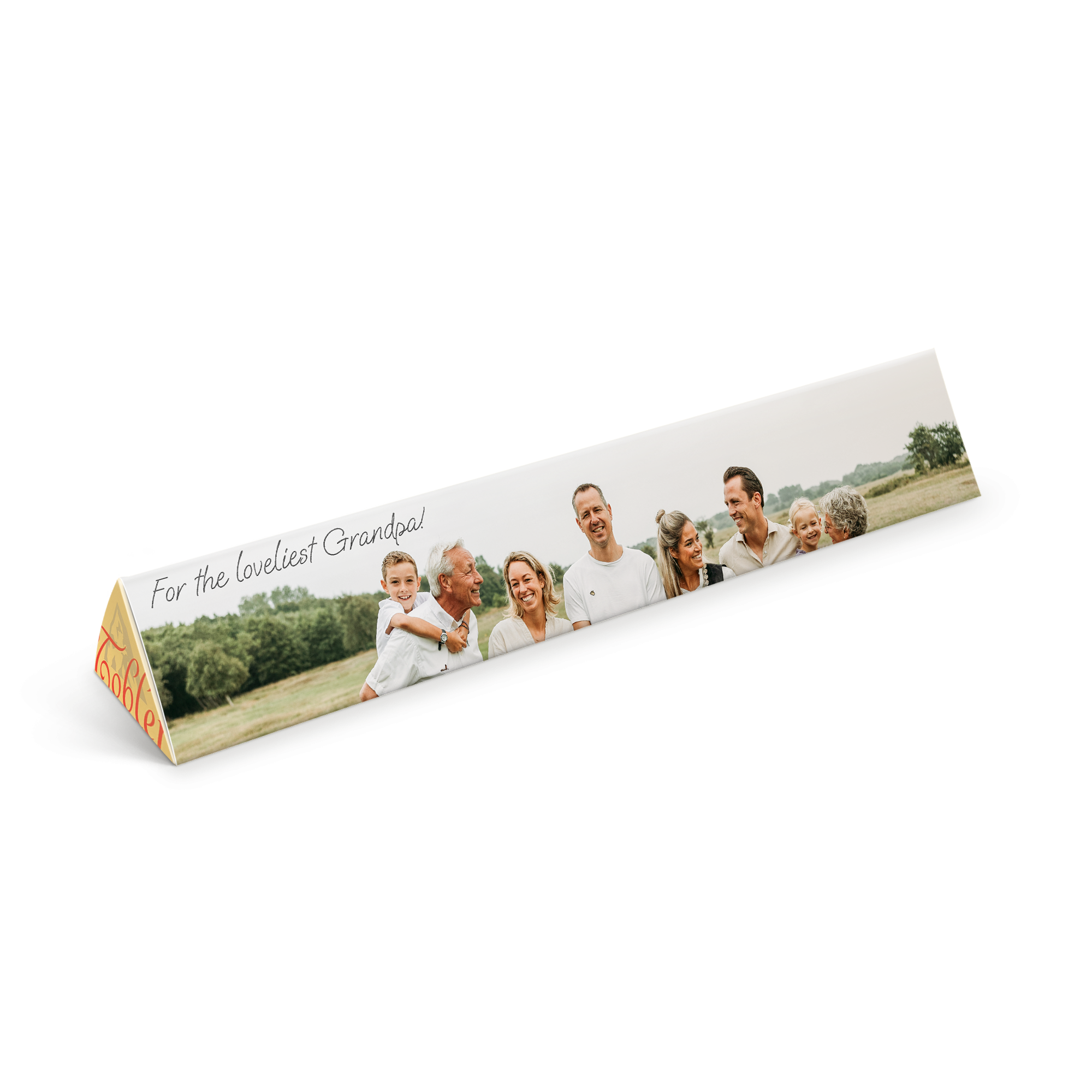 Personalised Toblerone chocolate bar with a photo of a family printed on the wrapper and the text For the loveliest Grandpa!