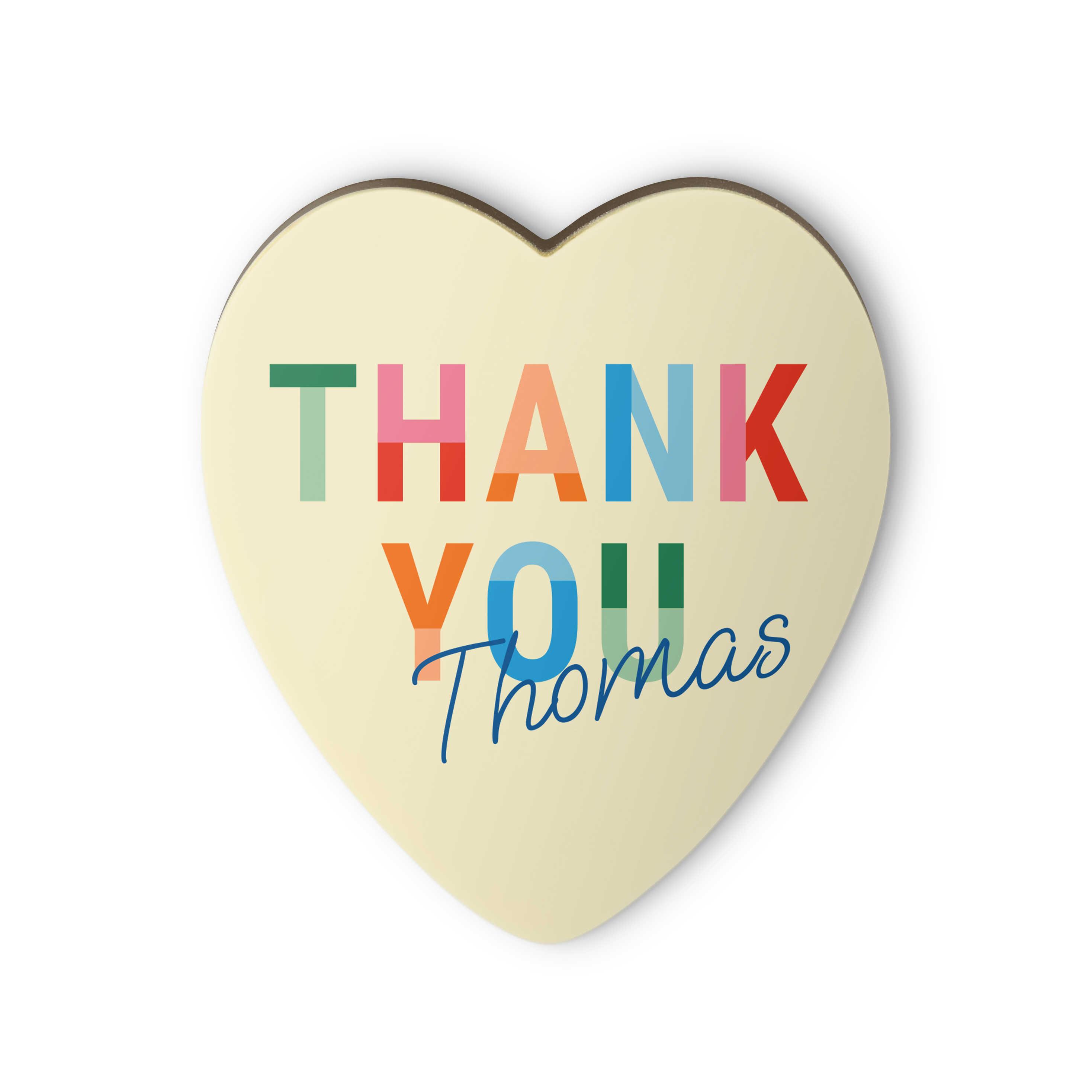 Wit chocoladehart met "THANK YOU Thomas" bedrukt in vrolijke kleuren. Liefde gaat door de maag, zeker met een persoonlijk bedrukt chocoladehart.