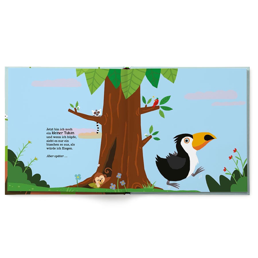Personalisierbares fröhliches Kinderbuch mit Dschungelmotiv und Text "Jetzt bin ich noch ein kleiner Tukan"