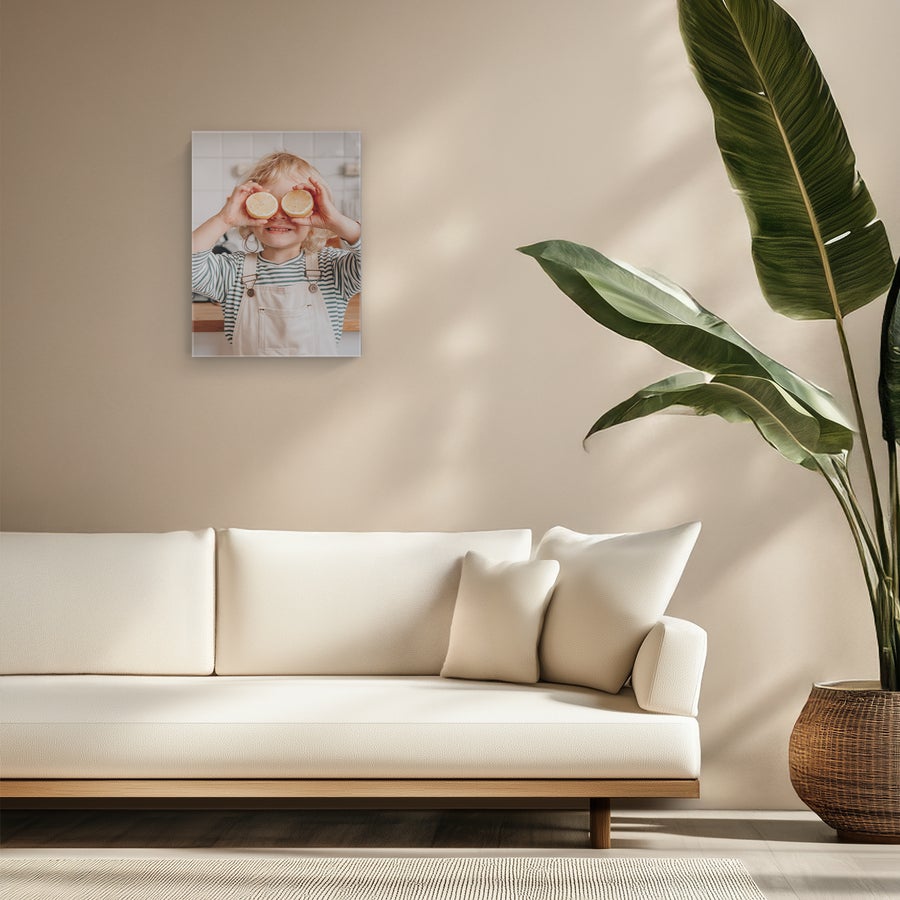 Personalised photo canvas Personalized photo canvas printed with a photo of a child holding lemons over their eyes