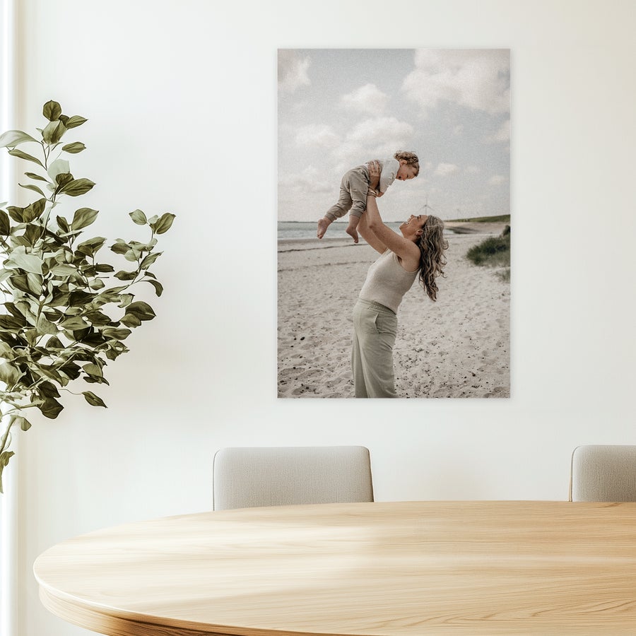 Photo on forex A personalized photo on forex of a woman holding a baby on a beach as wall decoration