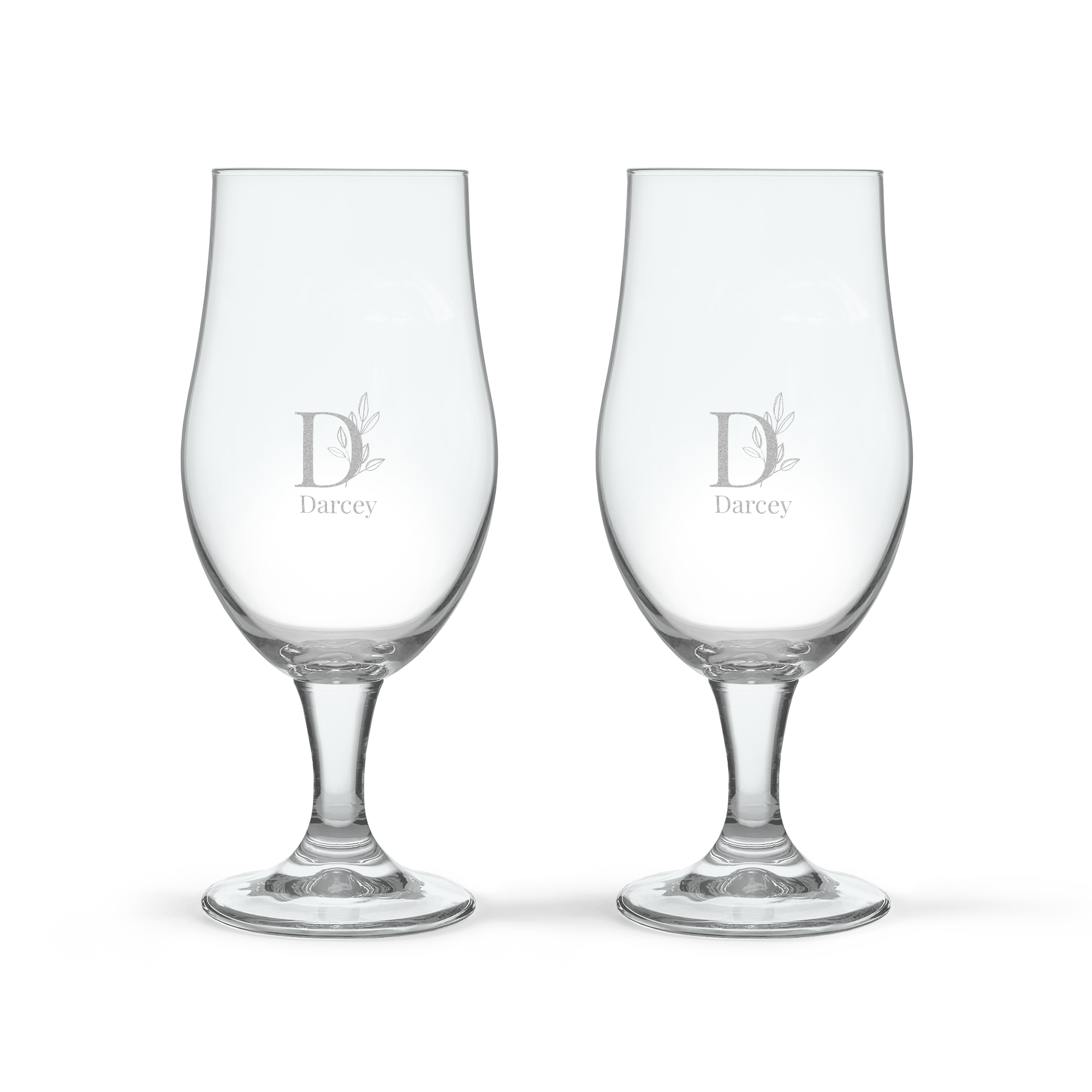 Two clear Royal Leerdam beer glasses, each engraved with a decorative D initial and the name Darcey, ideal for any beer lover.
