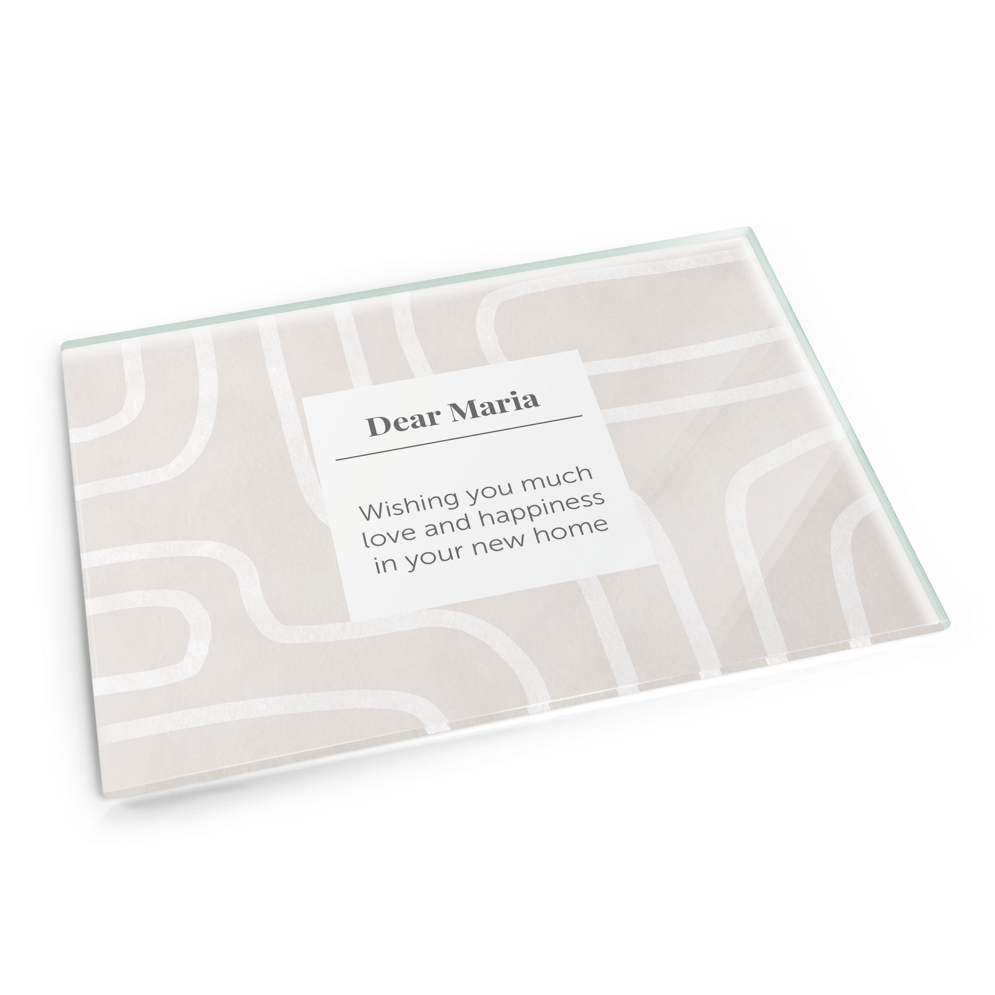 Personalised glass chopping board with a printed message "Dear Maria Wishing you much love and happiness in your new home"