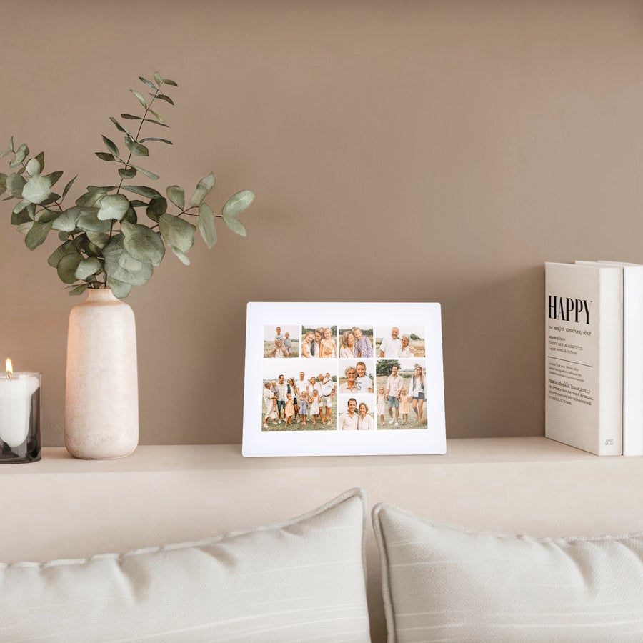 Aluminum photo frame ChromaLuxe aluminum photo frame with a printed collage of family photos, visible on a shelf in a neutral room