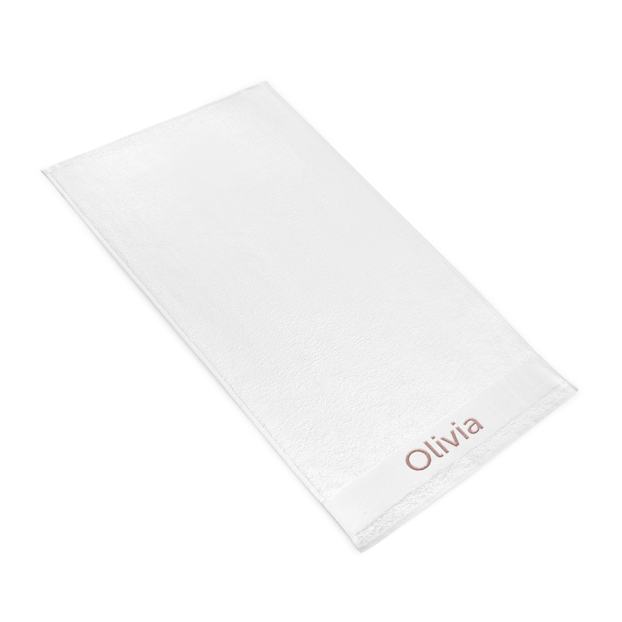 Weisses Badetuch personalisiert mit dem Namen Olivia in Rot bestickt.