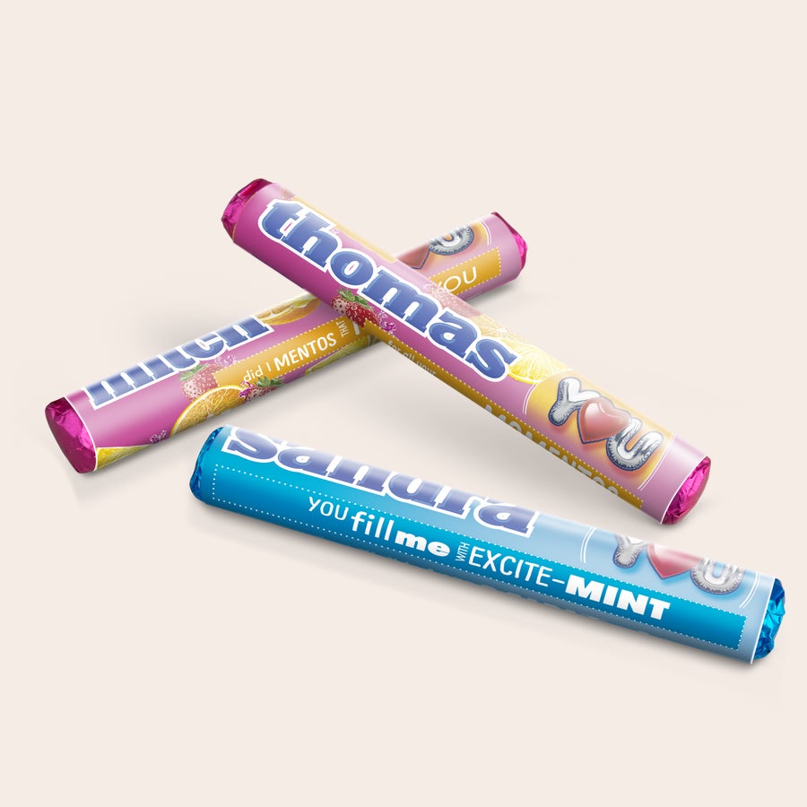 Mentos-rullat lahjapakkauksessa kuvalla ja/tai tekstillä Mentos-rullat lahjapakkauksessa kuvalla ja/tai tekstillä
