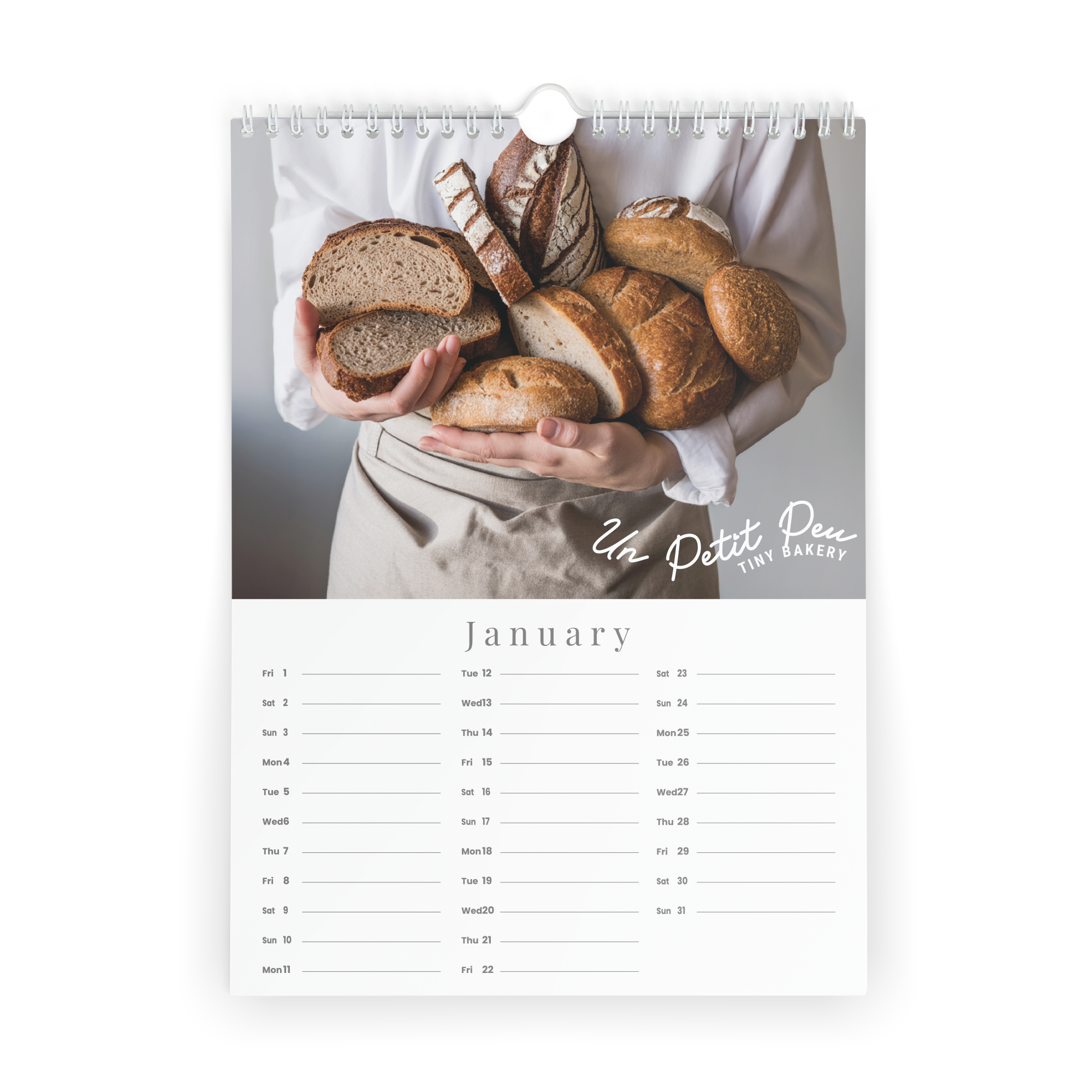 Personalized Printed Calendar for 2026 - Vertical featuring custom photo and text on the wall.