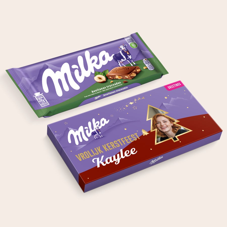 Gepersonaliseerde Milka reep - Hazelnoot Gepersonaliseerde Milka reep - Gebroken noten met eigen foto en naam Kaylee, Vrolijk Kerstfeest erop geprint.
