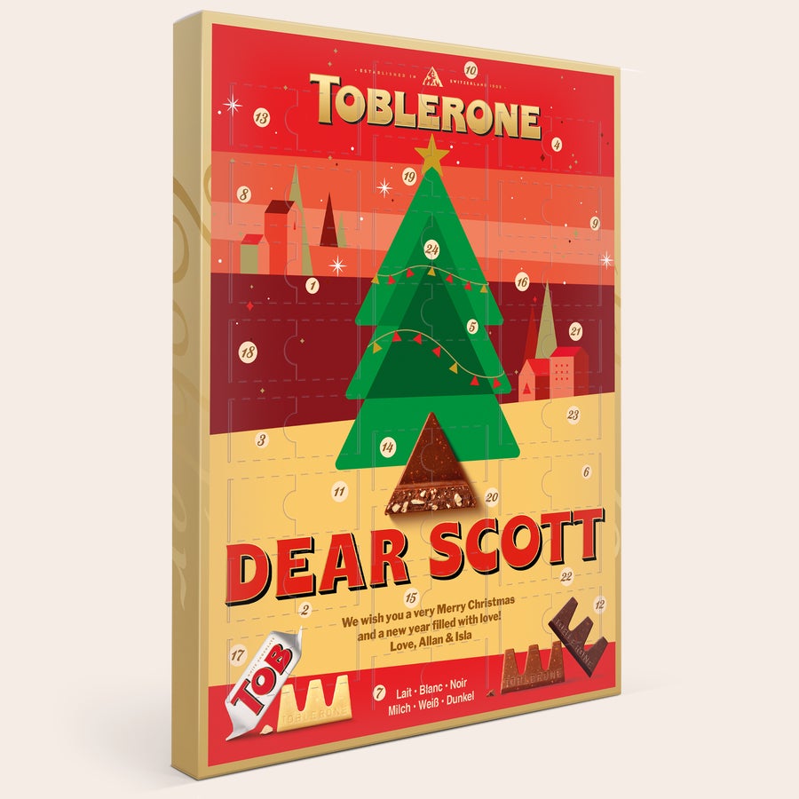 Personalizowany kalendarz Adwentowy Toblerone 2025 Kalendarz adwentowy Toblerone z choinką, personalizacją "DEAR SCOTT" i świątecznymi życzeniami, słodkie odliczenie do Świąt
