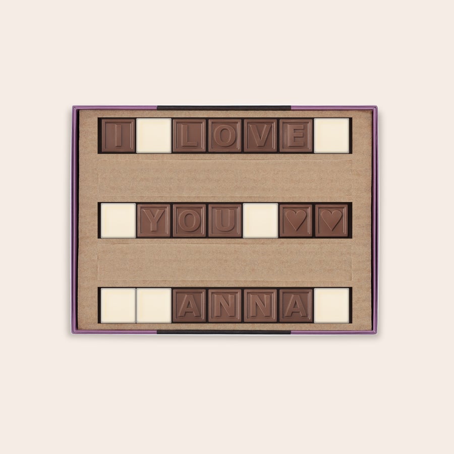 Personligt Chokolade Telegram Personligt chokoladetelegram med "I LOVE YOU ANNA" i mælke- og hvid chokolade, der fortæller dine yndlingsfolk, hvordan du føler dig.