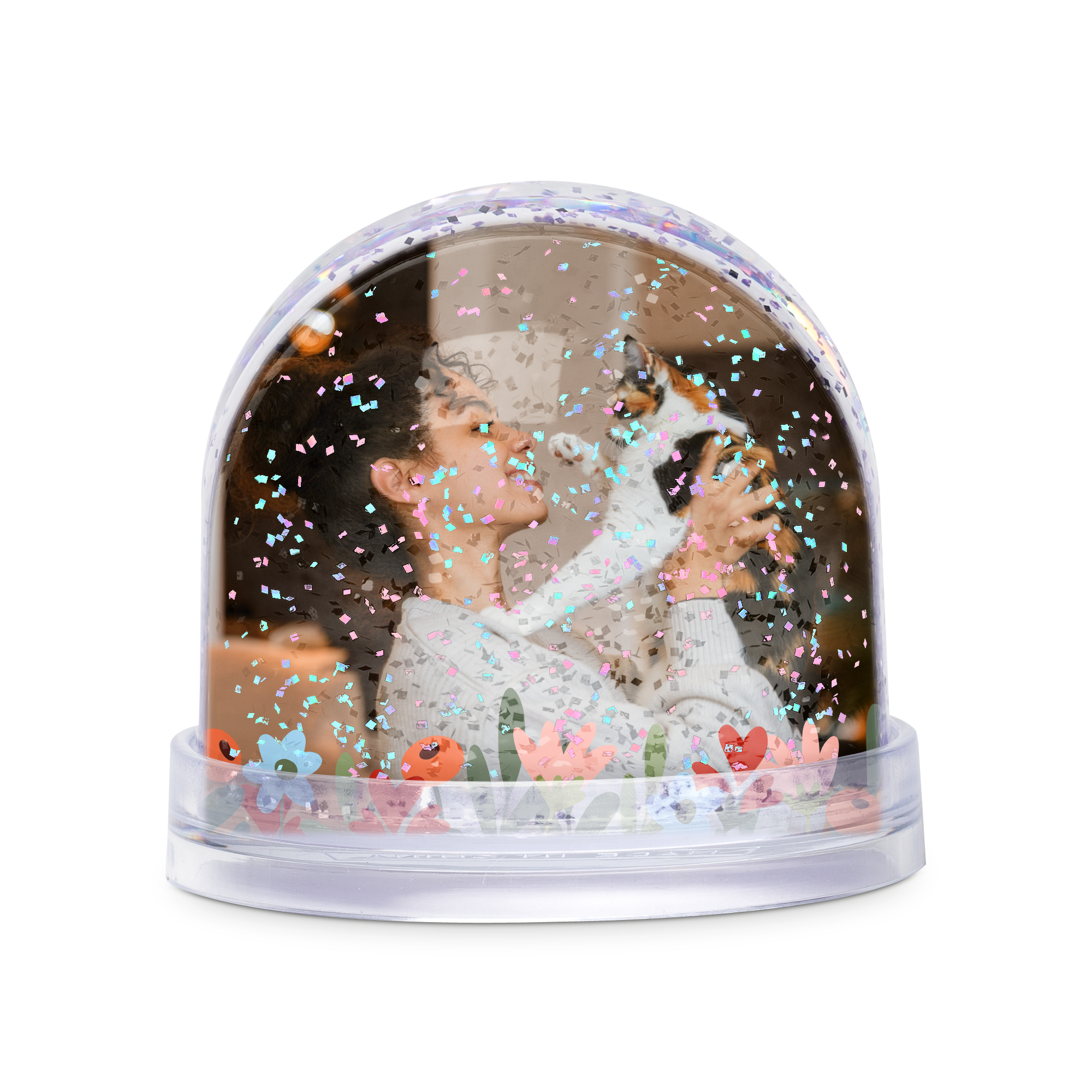 Yksilöity lumisadepallo kuvalla, jossa nainen pitää kissaa sylissään, pallossa satelee glitteriä.