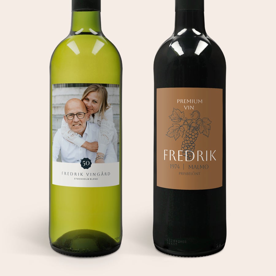 Belvy vinpaket present Belvy vinpaket med tryckt etikett, en flaska vitt vin med bild på ett par och texten Fredrik Vingård, en flaska rött vin med texten Fredrik
