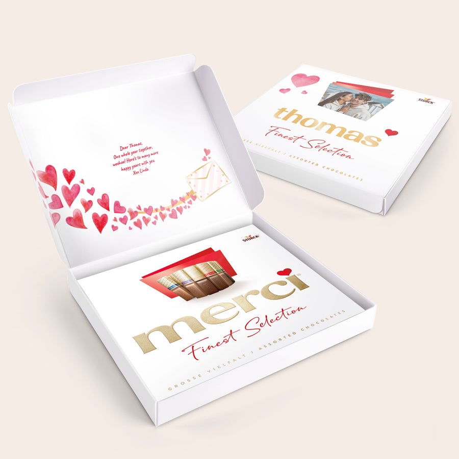 Merci chocolate with personalised card - 250 grams Merci chocolate with personalised card - 250 grams with a custom name Thomas and photo printed on the lid and a message from Linda inside.