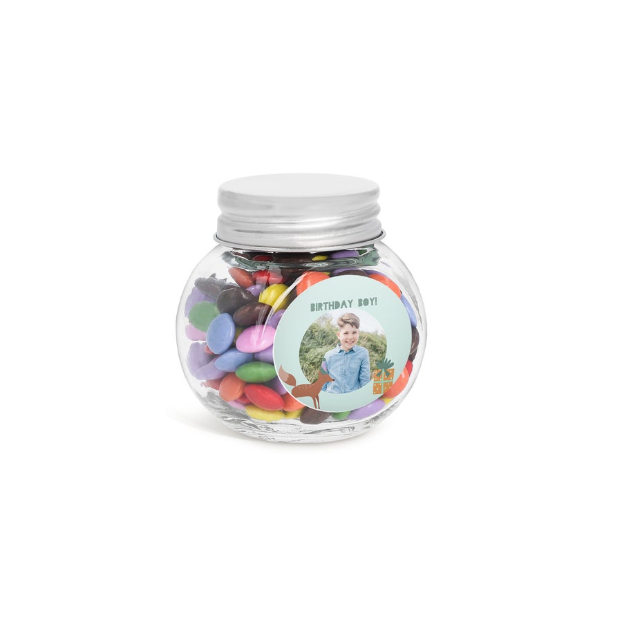 Personalised Mini Glass Jar Favours with Chocolates Glass jar of colourful chocolates with a custom photo and "BIRTHDAY BOY!" printed on the label, making great personalised favours
