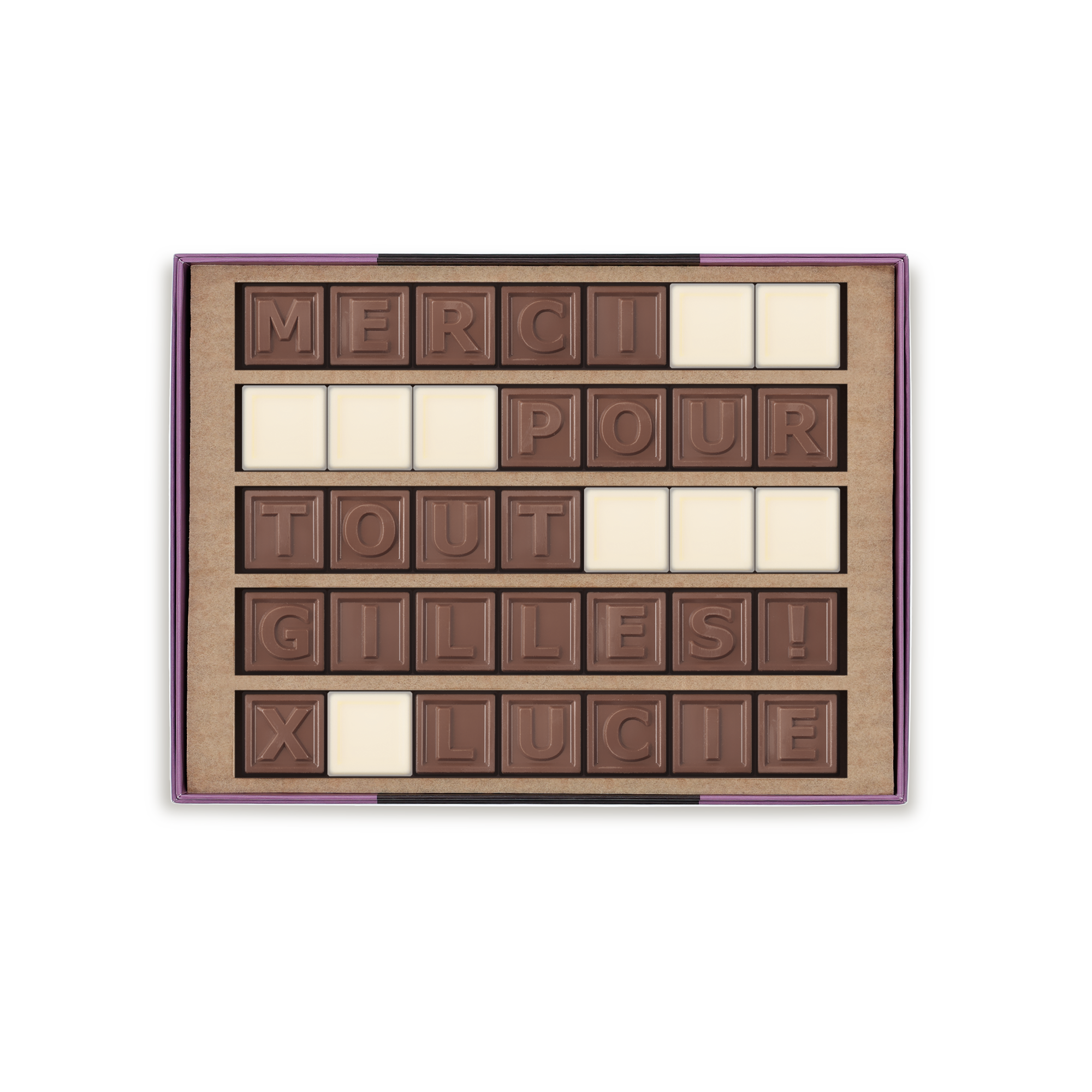 Votre télégramme chocolaté personnel « MERCI POUR TOUT GILLES ! X LUCIE » avec blocs de chocolat au lait et espaces blancs. Miam !