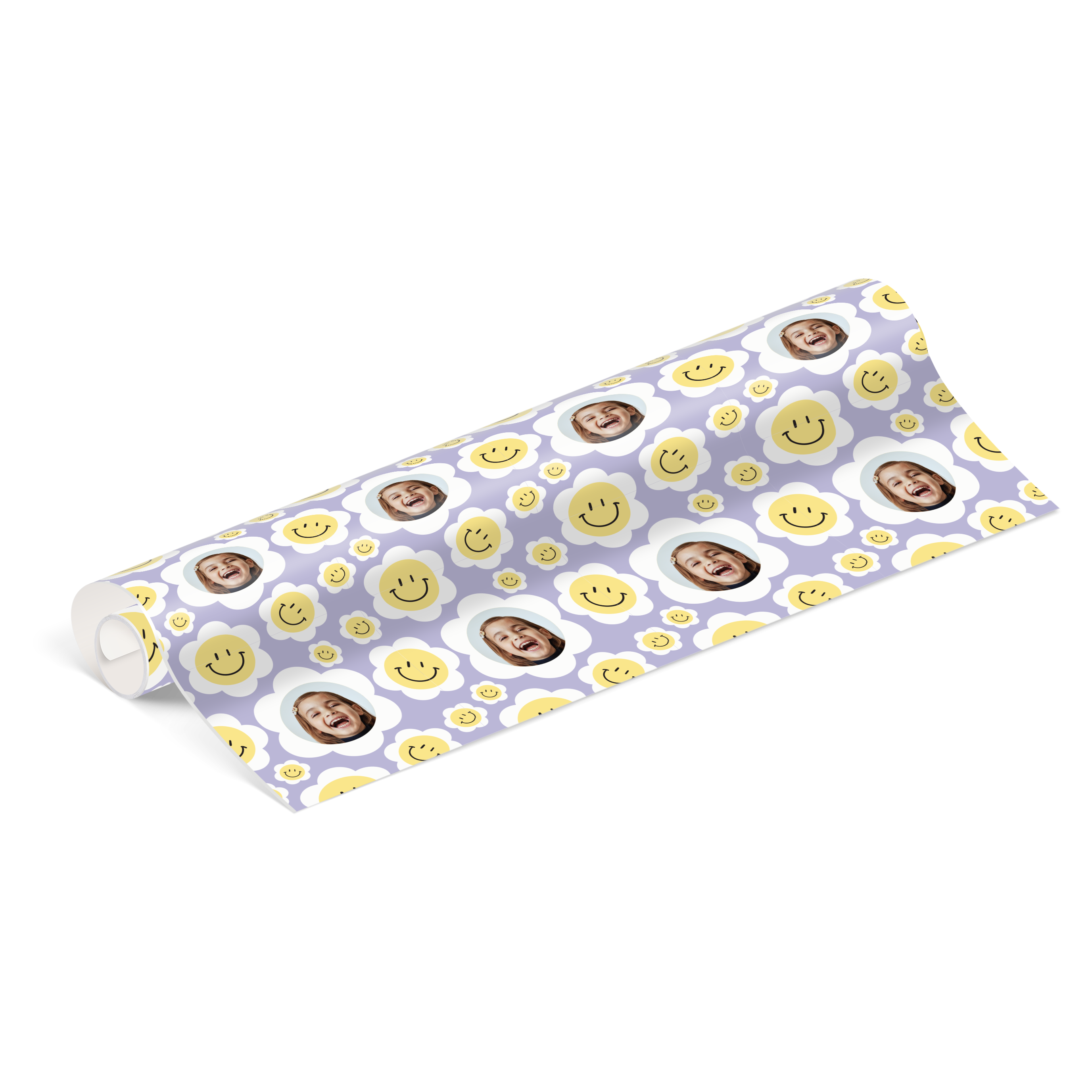 Personalised wrapping paper with a pattern of smiling faces and custom printed photos of a child.