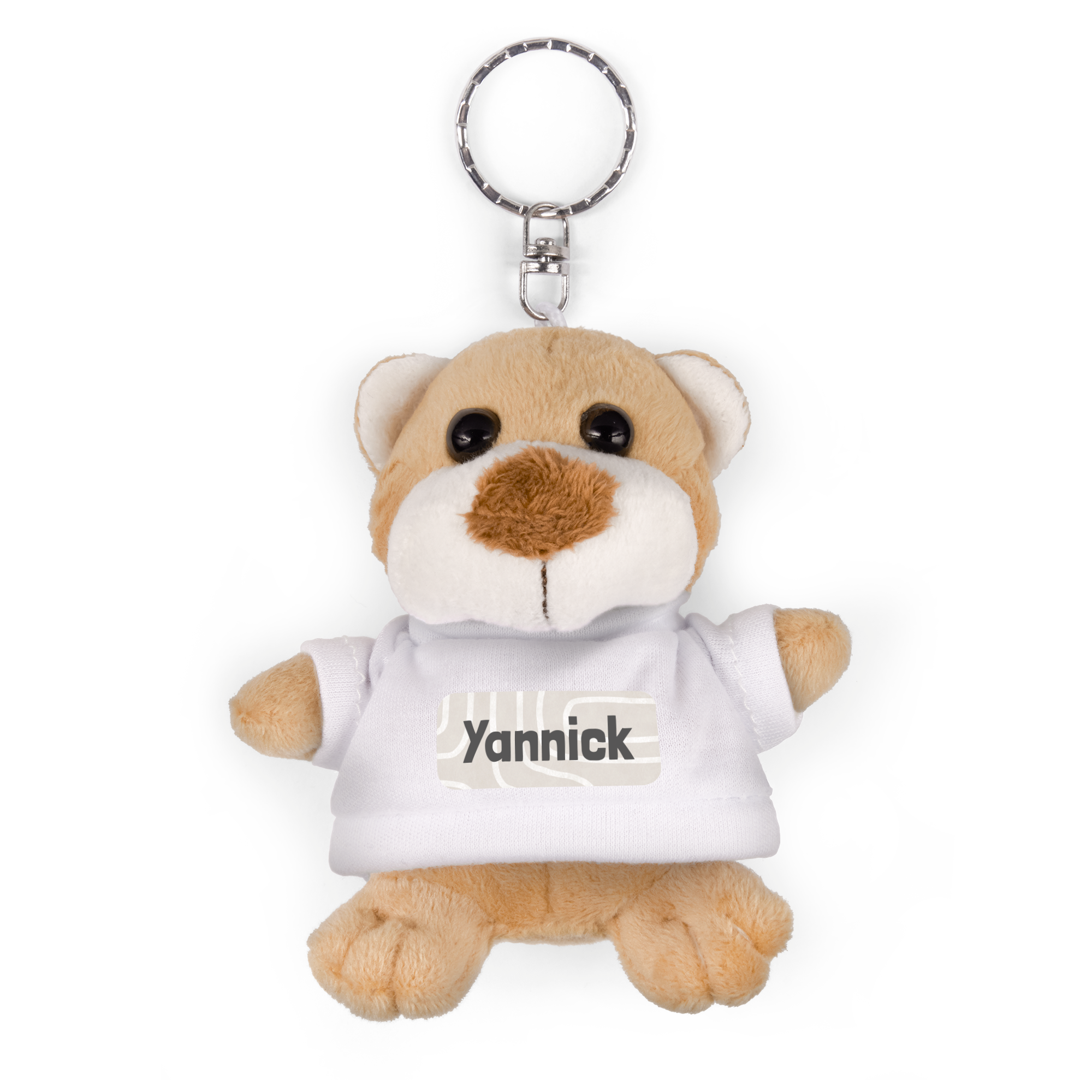 Bedrukte sleutelhanger met pluche beer en de naam Yannick op een wit T-shirt