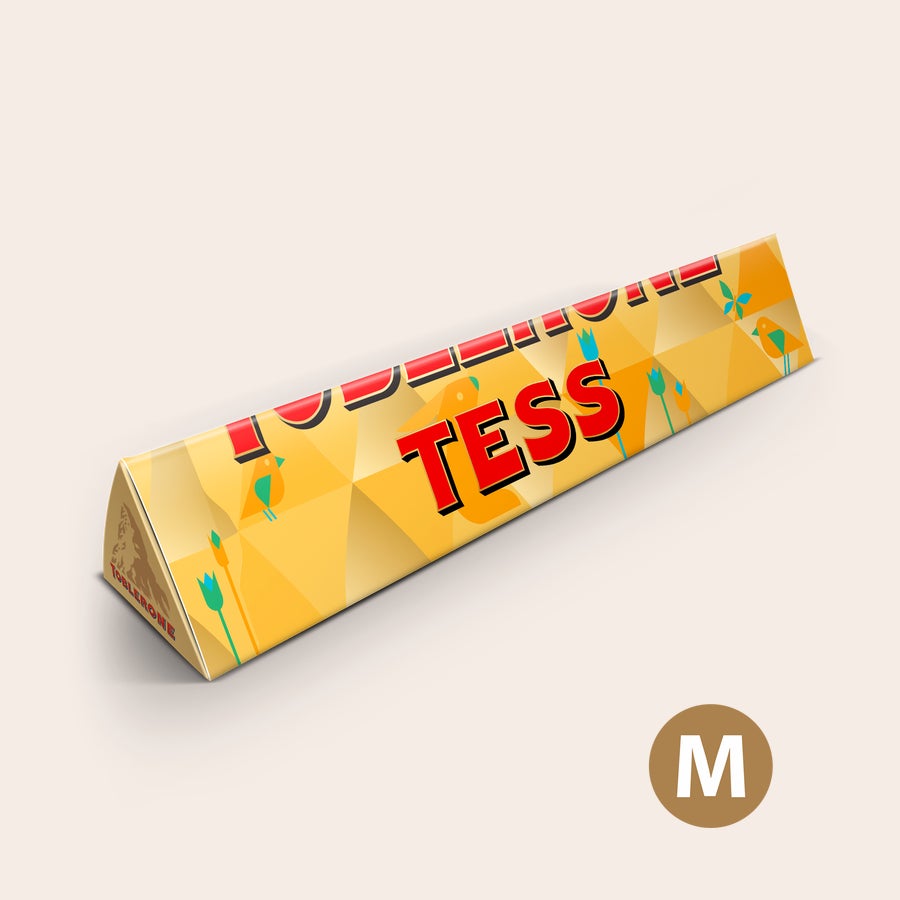 Toblerone Pasen met naam Gepersonaliseerde Toblerone paasreep met naam 'TESS' en vrolijke paasafbeeldingen geprint