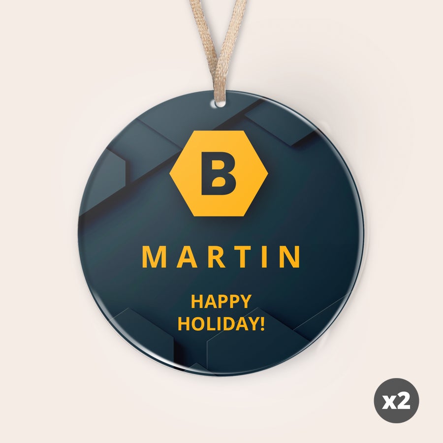 Personlig pleksiglass julepynt Personlig julepynt i pleksiglass med gravert B-logo, navnet Martin og teksten Happy Holiday!