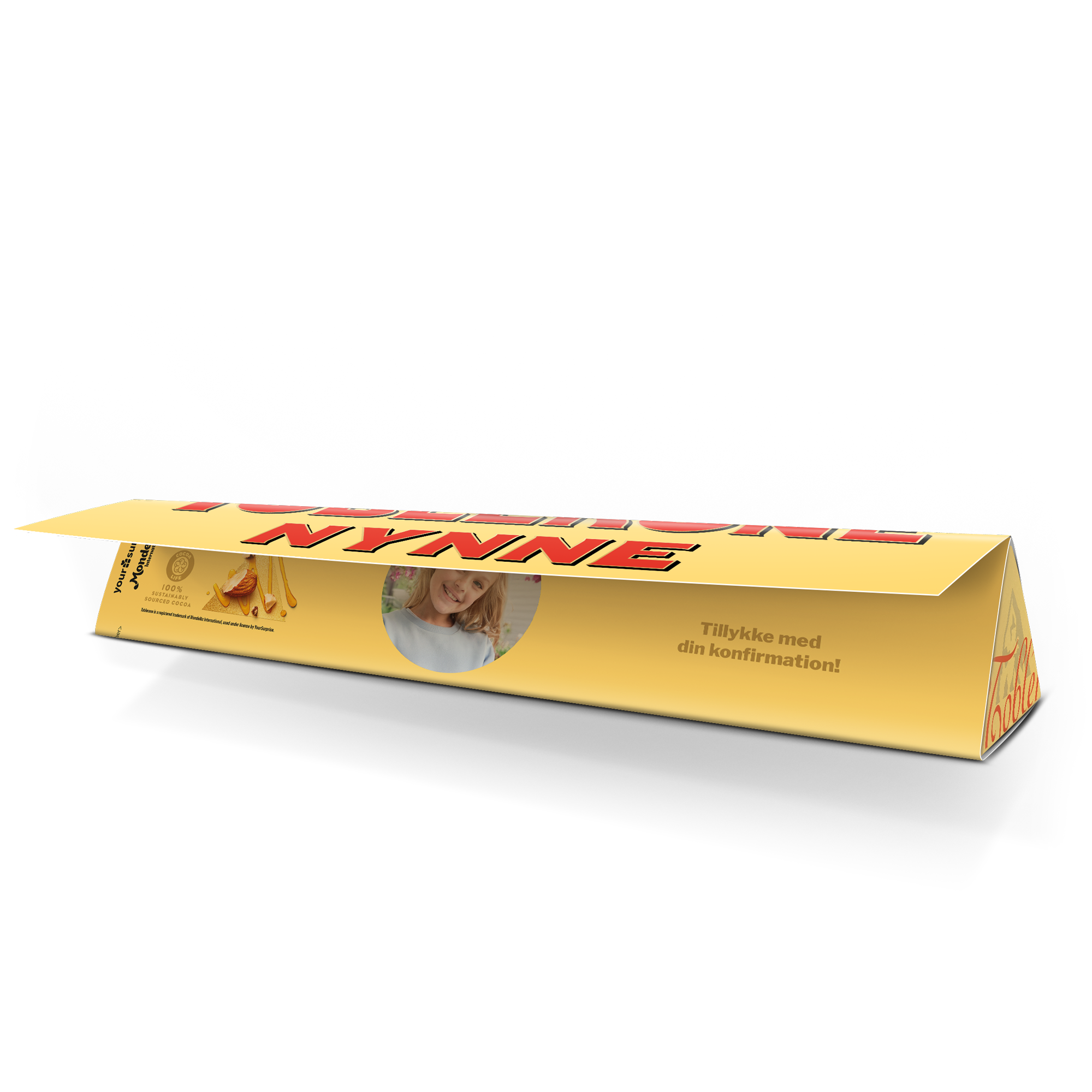 En stor personlig Toblerone chokolade med et trykt billede af en pige og teksten Tillykke med din konfirmation
