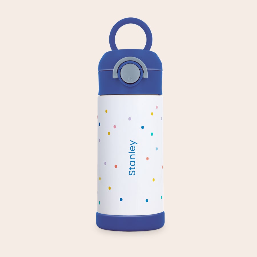 Botella de agua para niños con foto Botella de agua de acero inoxidable para niños, personalizada con nombre "Stanley" en azul y puntos de colores.