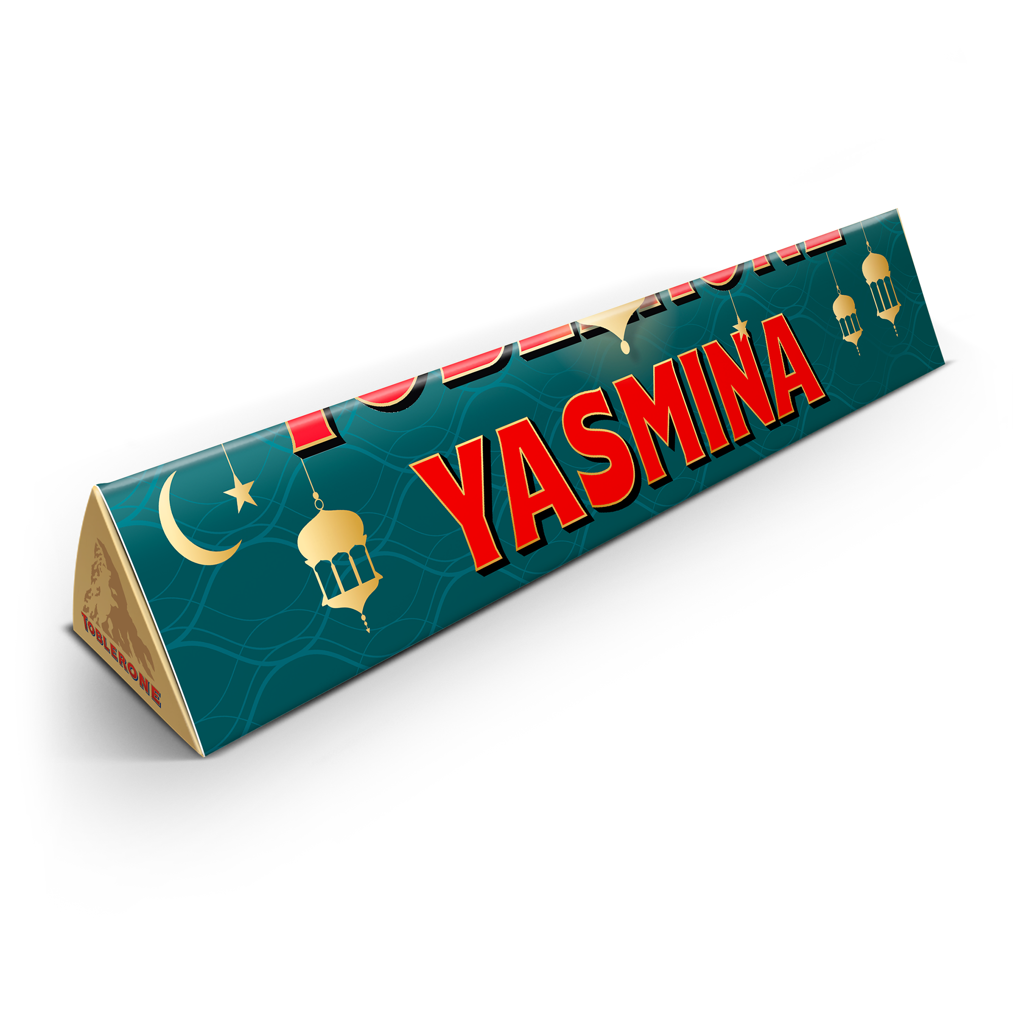 En personaliserad Toblerone XXL i grön förpackning med namnet Yasmina tryckt i rött.