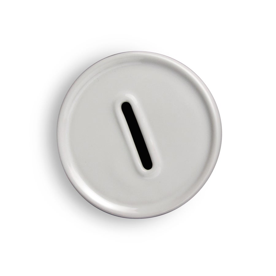 Personalised money box Top-down view of a plain white ceramic personalised money box with a coin slot.