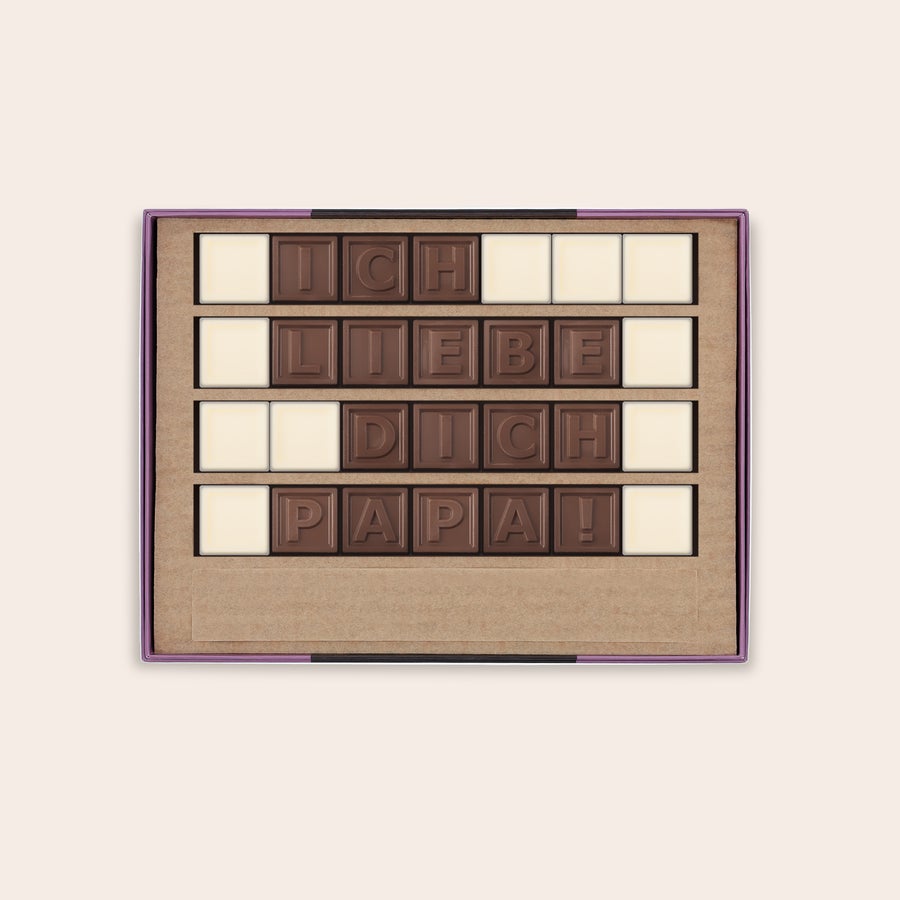 Schokotelegramm Selber Gestalten Genieße ein persönliches Schokoladentelegramm in einer Box, bestehend aus Milch- und weißer Schokolade, mit dem personalisierten Schriftzug ICH LIEBE DICH PAPA!