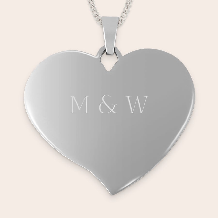 Engraved heart necklace large Silver heart-shaped pendant engraved with initials M & W, a unique silver colored pendant engraved with a name