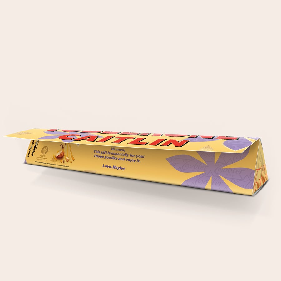 Toblerone - Den matek personalizovaná čokoládová tyčinka Toblerone s jménem Caitlin a vzkazem pro maminku, potištěná na obalu